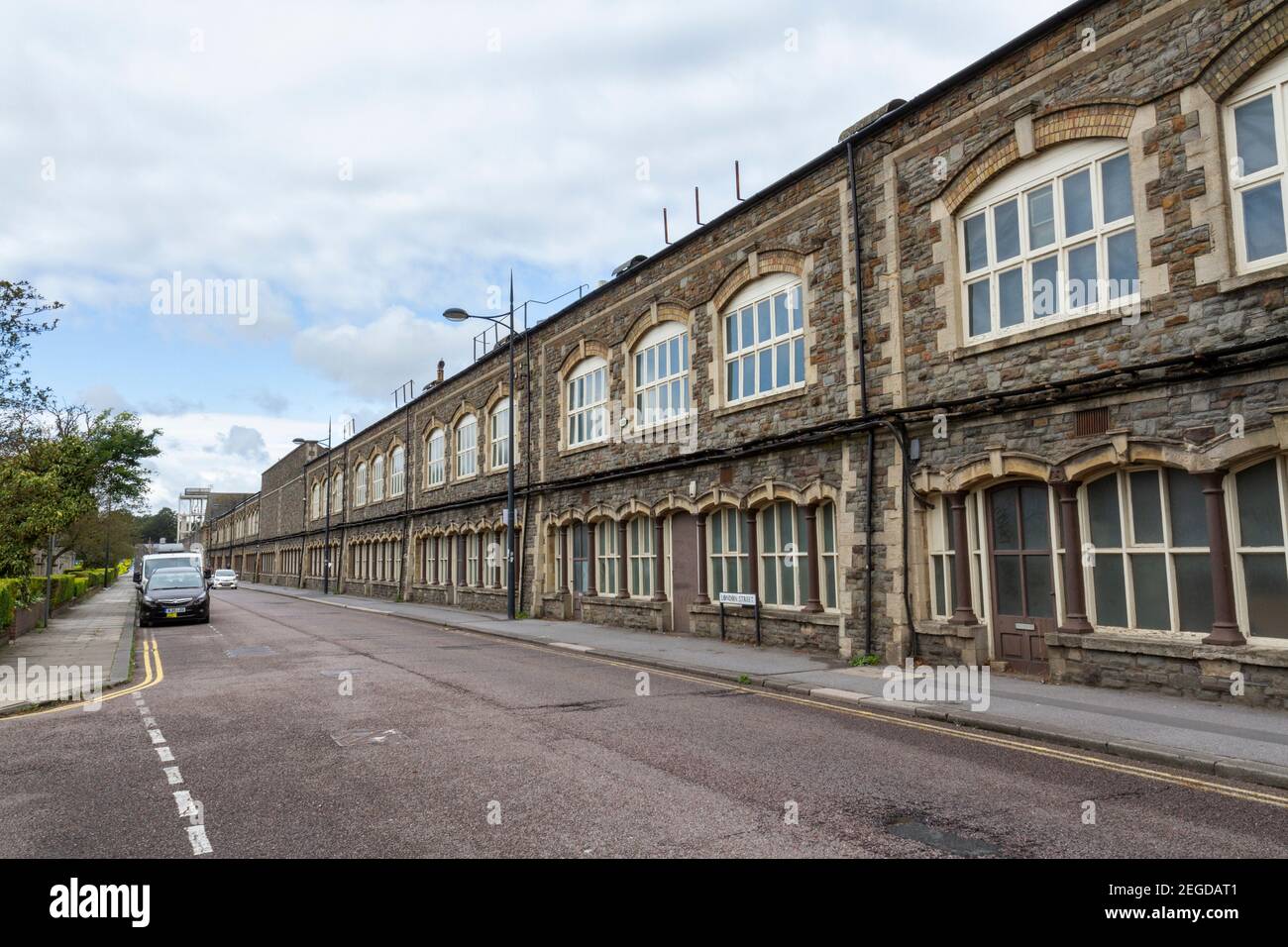 General view of the facade of the old GWR Carriage Works along London Street in Railway Village, Swindon, Wiltshire, UK. Stock Photo