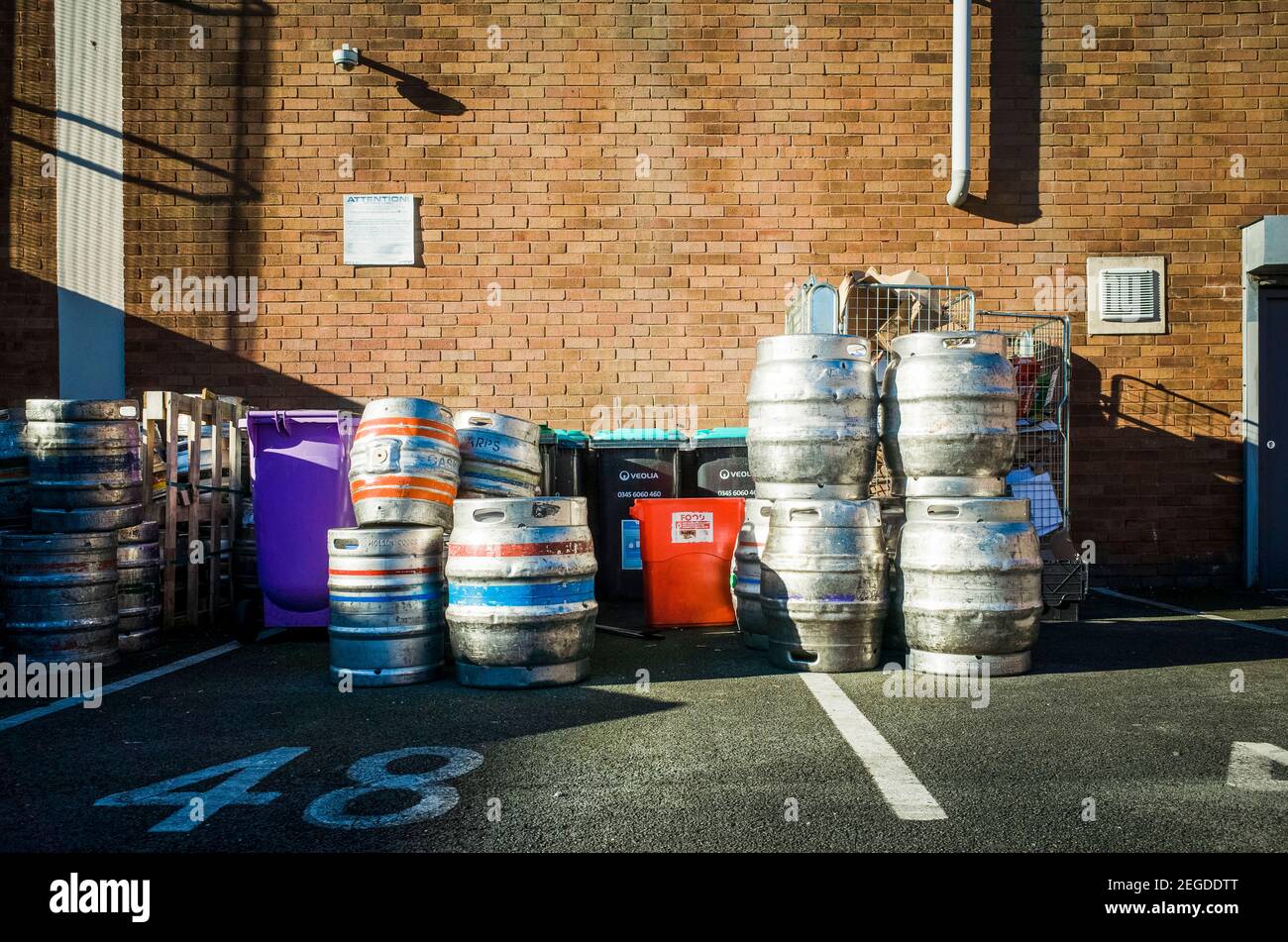 Beer barrels and kegs around the back of Wetherspoons in Liscard Stock Photo