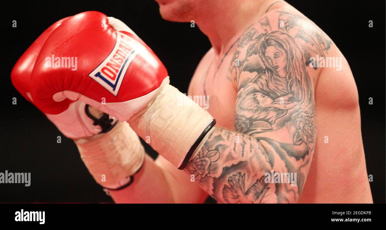 Boxing - Steve Williams v Kirk Goodings - British Masters Light Welterweight Title - Aintree Equestrian Centre - 30/11/12  General view of Kirk Goodings' tattoos  Mandatory Credit: Action Images / Carl Recine Stock Photo