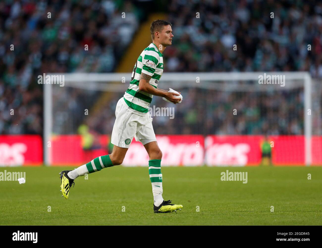 Soccer Football - Champions League - Third Qualifying Round First Leg -  Celtic v AEK Athens - Celtic Park, Glasgow, Britain - August 8, 2018  Celtic's Mikael Lustig carries foam off the