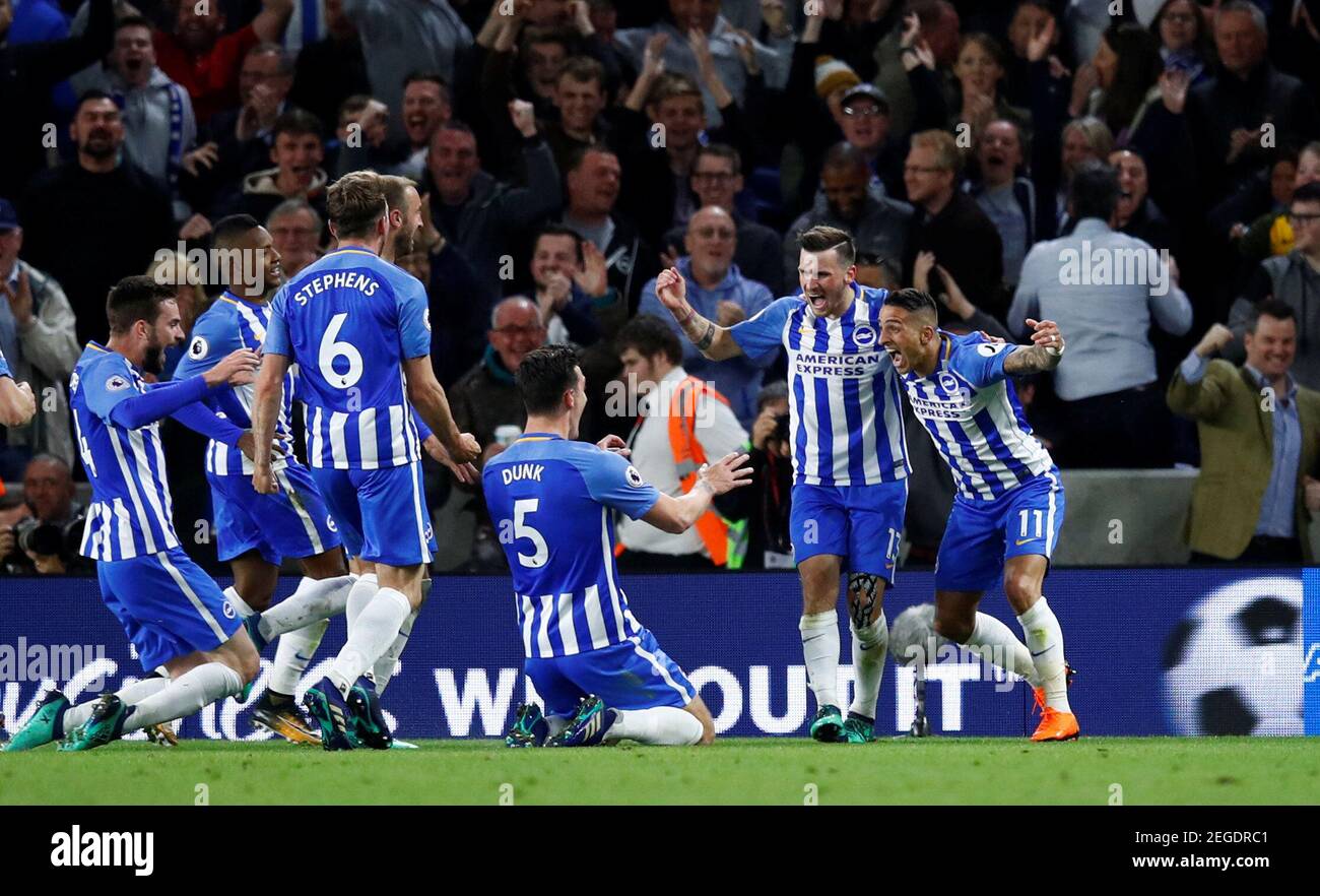 Soccer Football - Premier League - Brighton & Hove Albion v Manchester United - The American Express Community Stadium, Brighton, Britain - May 4, 2018   Brighton's Pascal Gross celebrates scoring their first goal with teammates   REUTERS/Eddie Keogh    EDITORIAL USE ONLY. No use with unauthorized audio, video, data, fixture lists, club/league logos or "live" services. Online in-match use limited to 75 images, no video emulation. No use in betting, games or single club/league/player publications.  Please contact your account representative for further details. Stock Photo