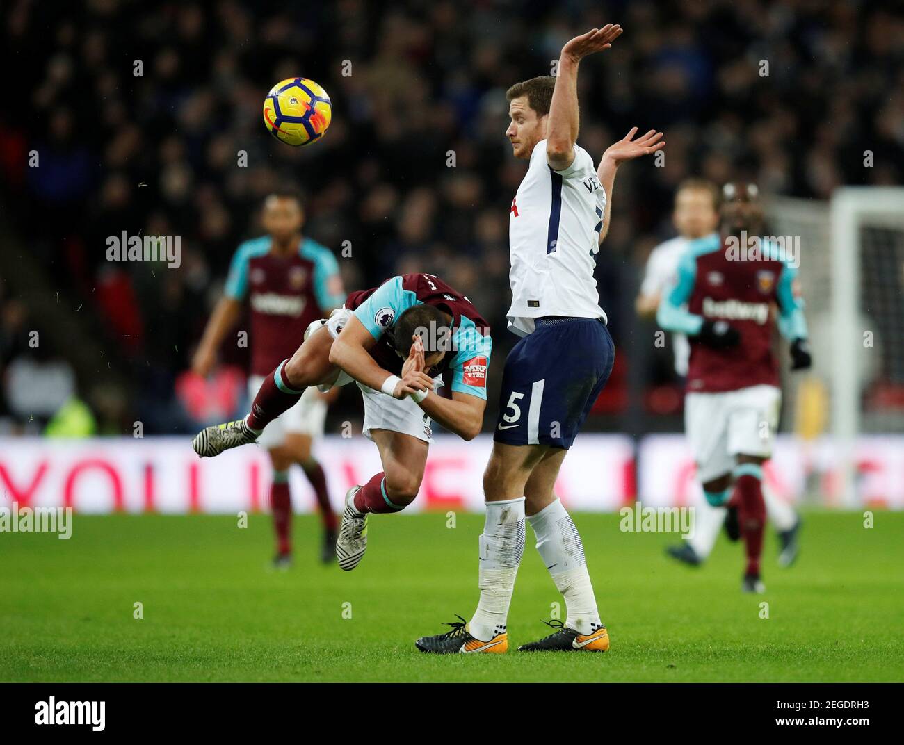 Soccer Football - Premier League - Tottenham Hotspur vs West Ham United - Wembley Stadium, London, Britain - January 4, 2018   West Ham United's Javier Hernandez in action with Tottenham's Jan Vertonghen    REUTERS/Eddie Keogh    EDITORIAL USE ONLY. No use with unauthorized audio, video, data, fixture lists, club/league logos or 'live' services. Online in-match use limited to 75 images, no video emulation. No use in betting, games or single club/league/player publications.  Please contact your account representative for further details. Stock Photo