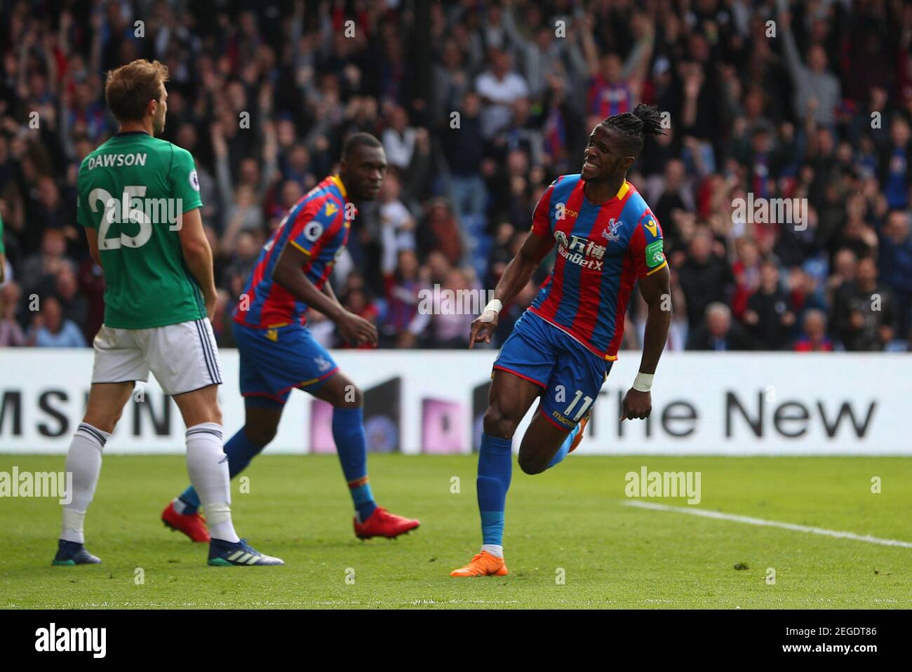 Soccer Football - Premier League - Crystal Palace vs West Bromwich Albion - Selhurst Park, London, Britain - May 13, 2018 Crystal Palace's Wilfried Zaha celebrates scoring their first goal REUTERS/Hannah McKay EDITORIAL USE ONLY. No use with unauthorized audio, video, data, fixture lists, club/league logos or "live" services. Online in-match use limited to 75 images, no video emulation. No use in betting, games or single club/league/player publications. Please contact your account representative for further details. Stock Photo