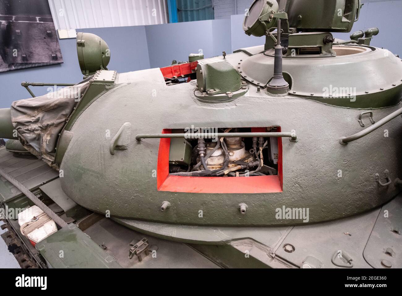 A T-55 tank with holes cut in its turret for training purposes on display at The Tank Museum at Bovington, in England. Stock Photo