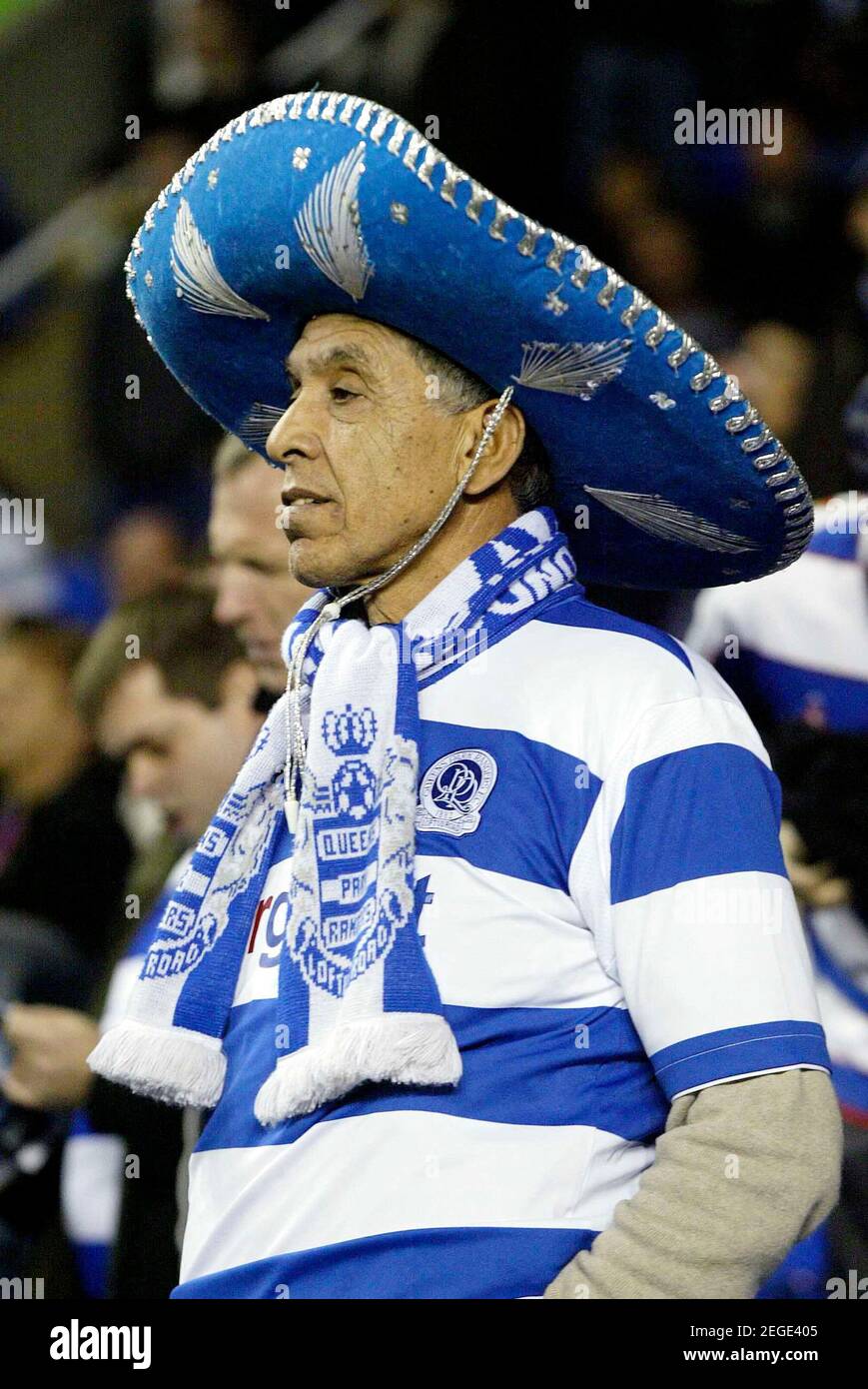 A Queens Park Rangers fan wearing a 