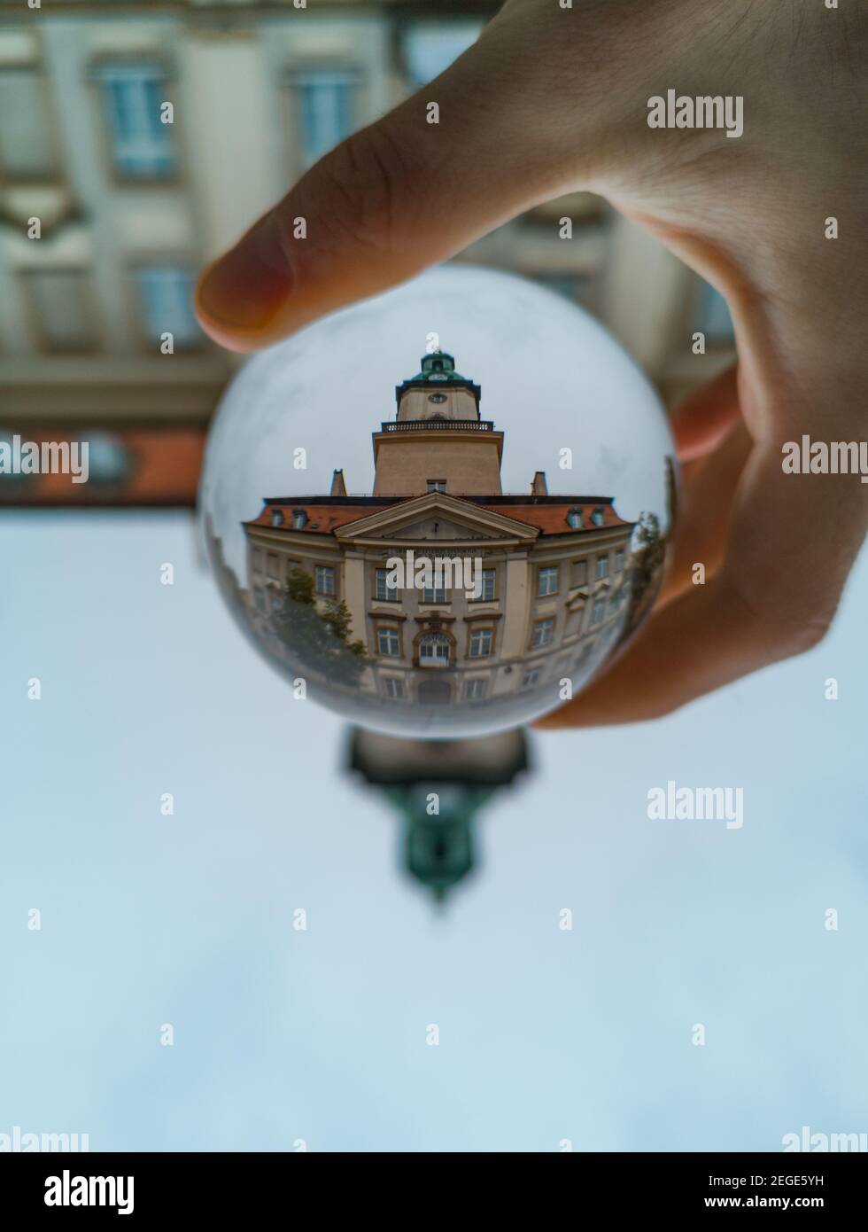 Jelenia Gora September 7 2019 Town hall with clock tower at market square in crystal glassy lensball Stock Photo