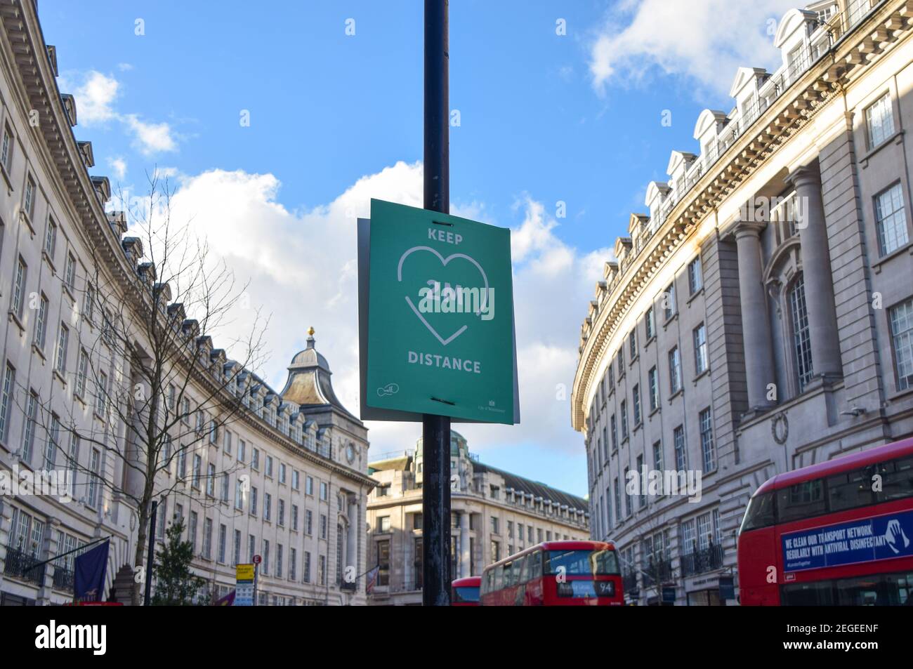 A social distancing sign on Regent Street, London, during the coronavirus pandemic. Stock Photo