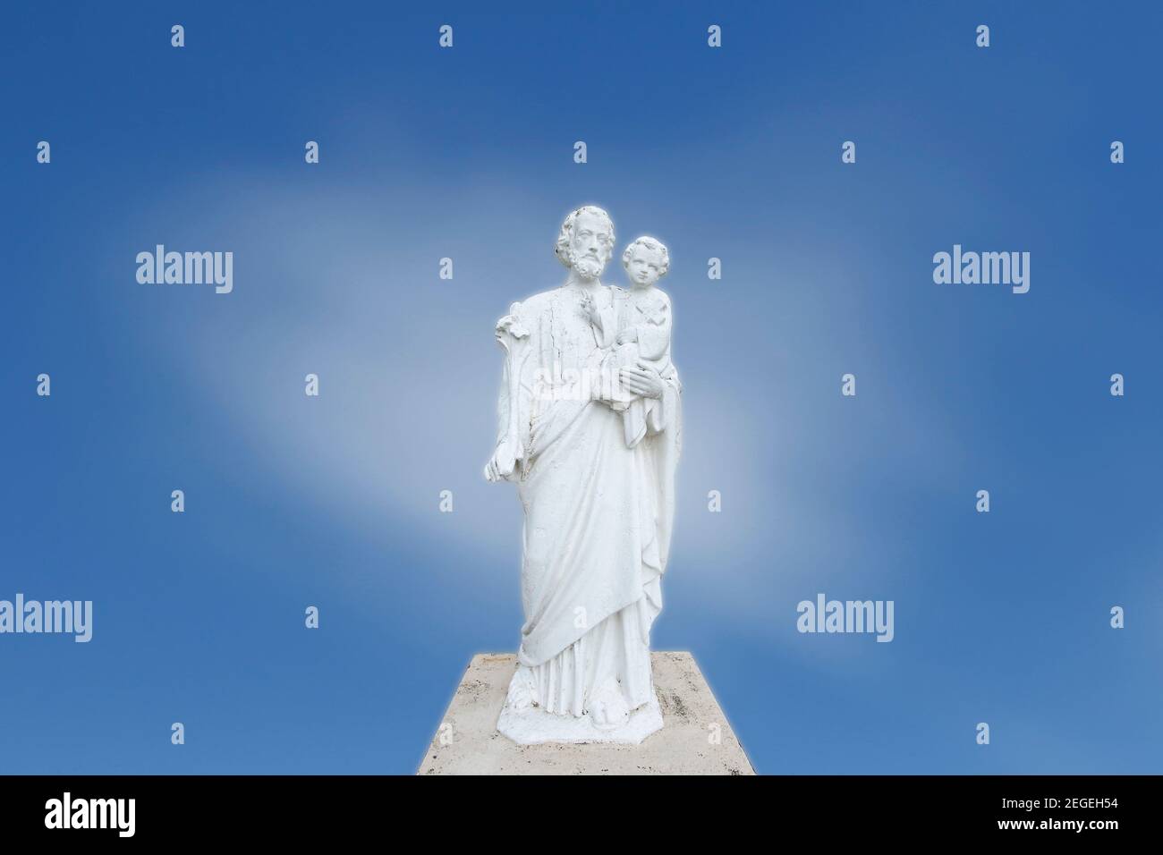 white carved image of Saint Joseph and child Jesus - St Joseph Stock Photo