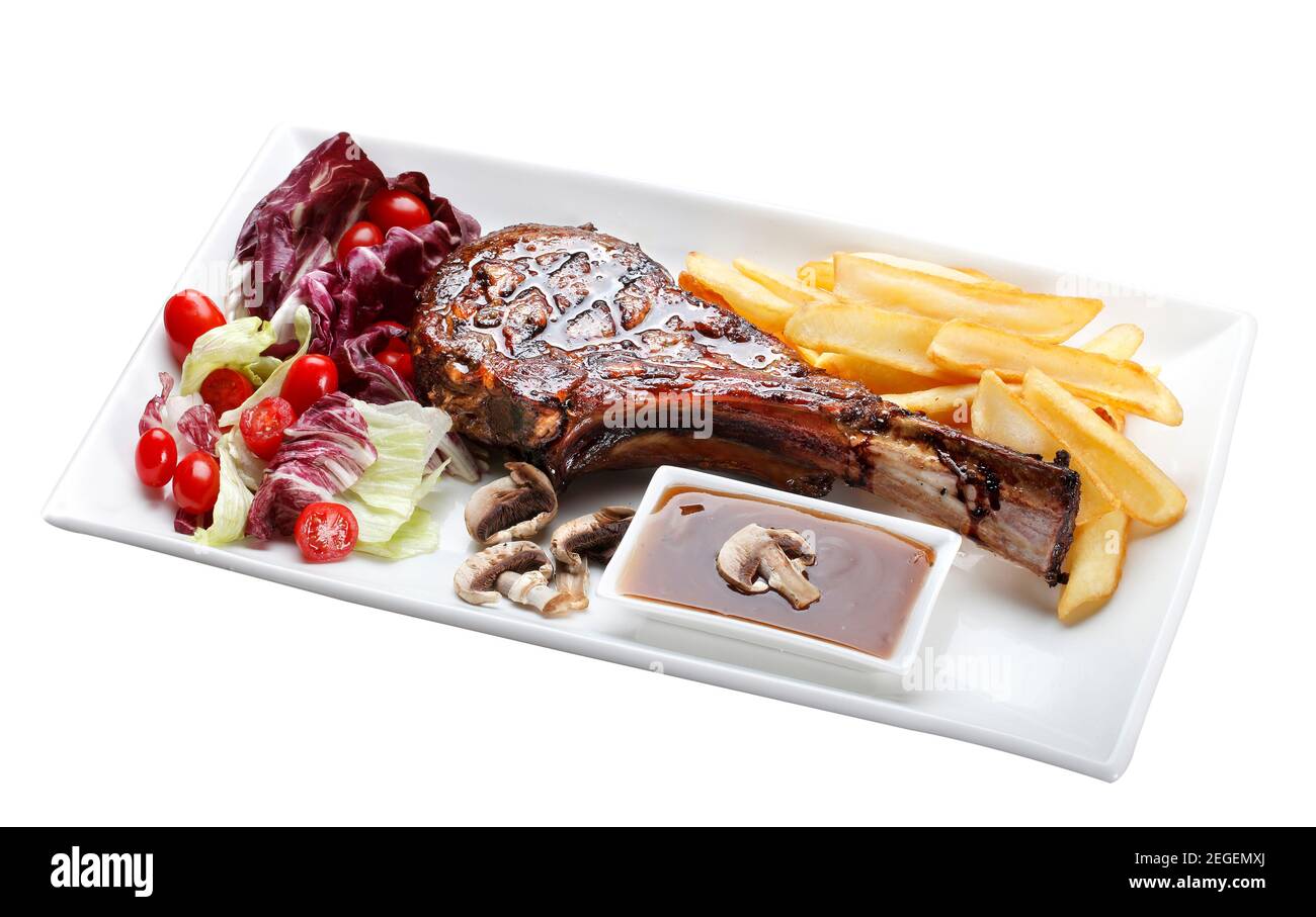 Prime rib with fries and salad Stock Photo - Alamy