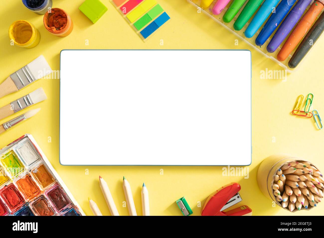 Online drawing class concept - supplies on bright background Stock