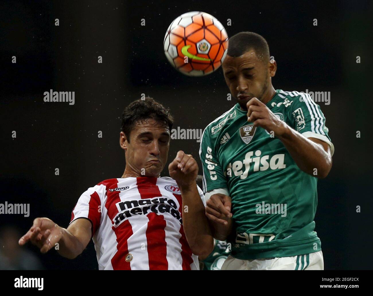 Football Soccer - Palmeiras v River Plate - Copa Libertadores - Arena Allianz stadium, Sao Paulo, Brazil 14/4/16. Brazil's Palmeiras Vitor Hugo (R) in action against Uruguay's River Plate Dario Flores.  REUTERS/Paulo Whitaker   Picture Supplied by Action Images Stock Photo