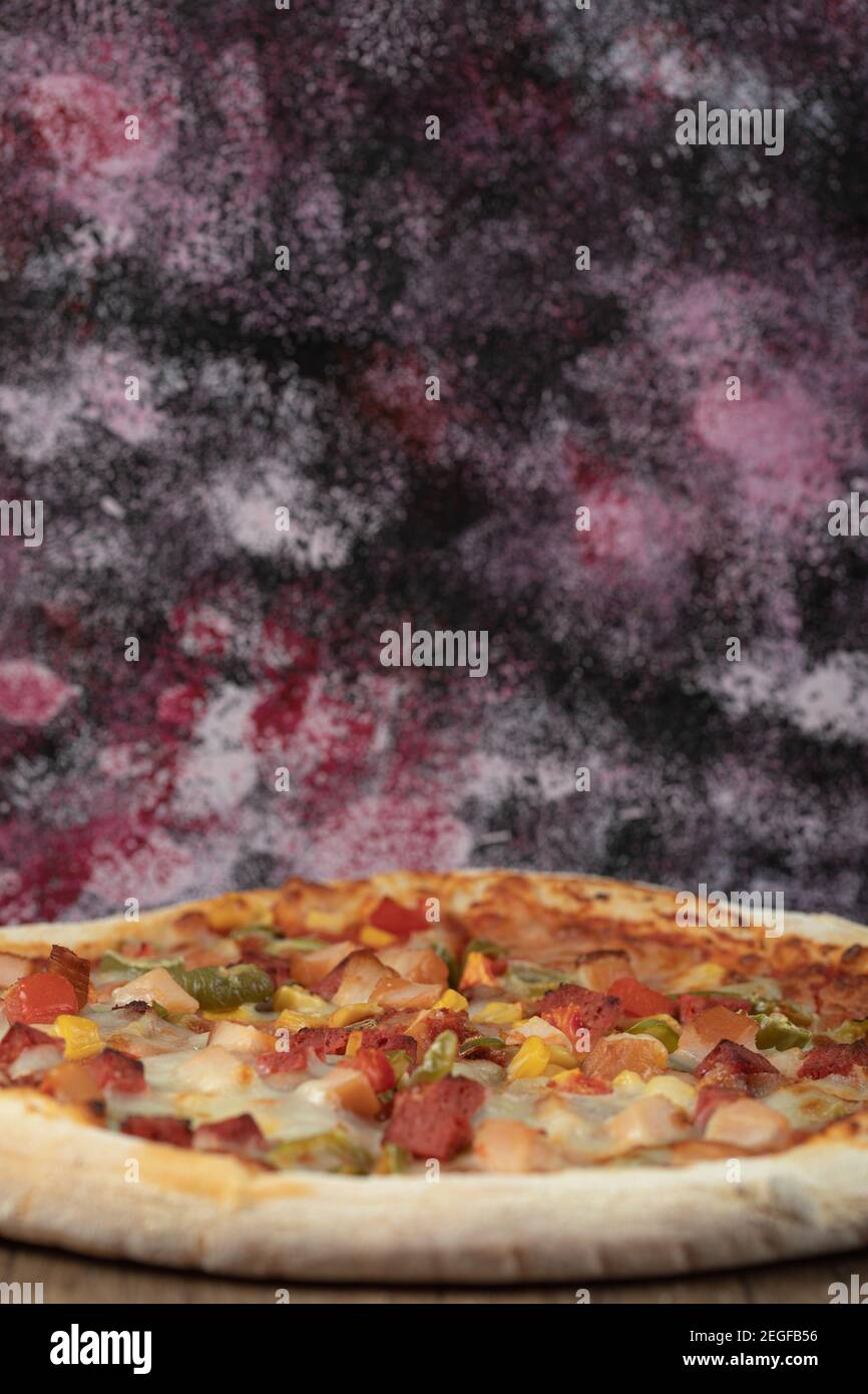 Cooked mixed ingredient pizza hi-res stock photography and images - Alamy