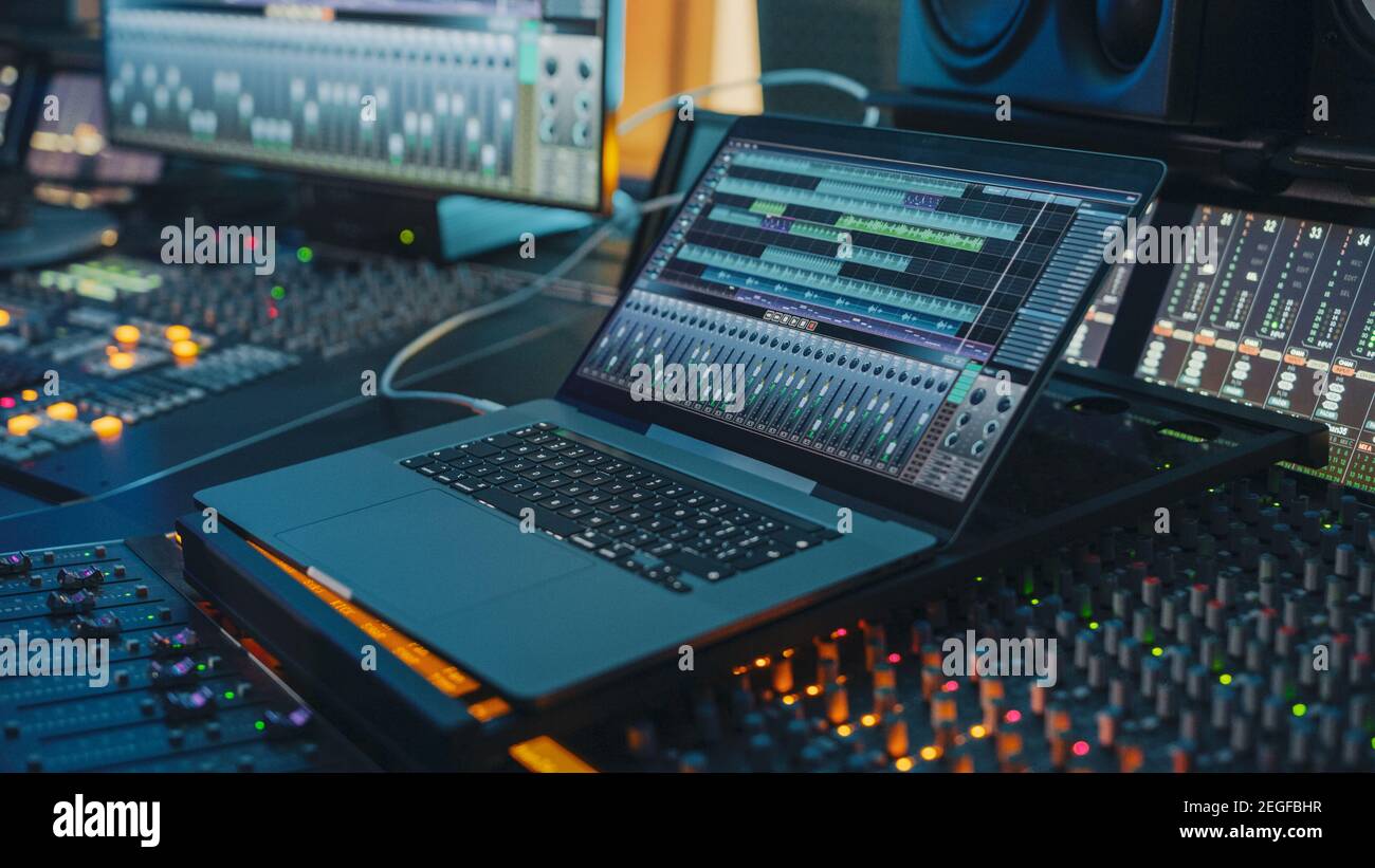 Modern Music Record Studio Control Desk with Laptop Screen Showing User  Interface of Digital Audio Workstation Software. Equalizer, Mixer and Stock  Photo - Alamy