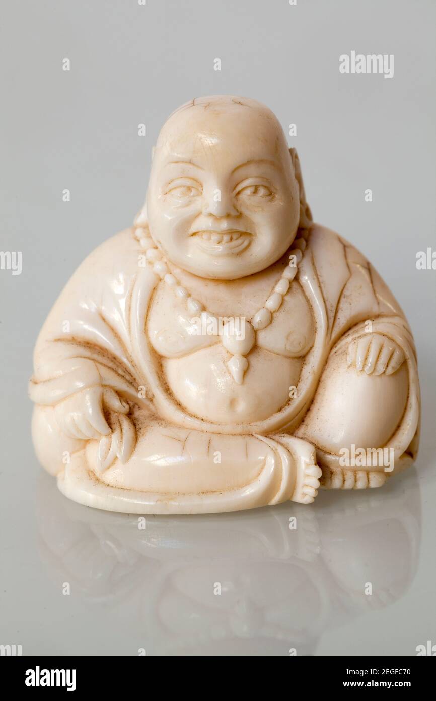 Antique Ivory Buddha Figure Stock Photo
