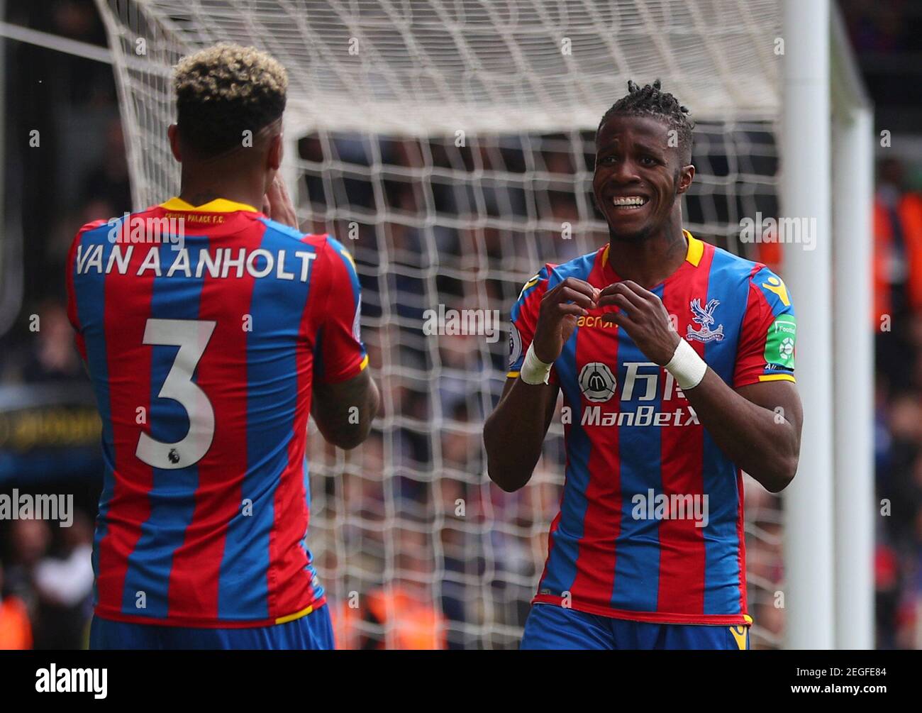 Soccer Football - Premier League - Crystal Palace vs West Bromwich Albion - Selhurst Park, London, Britain - May 13, 2018 Crystal Palace's Patrick van Aanholt and Wilfried Zaha react after a missed chance REUTERS/Hannah McKay EDITORIAL USE ONLY. No use with unauthorized audio, video, data, fixture lists, club/league logos or "live" services. Online in-match use limited to 75 images, no video emulation. No use in betting, games or single club/league/player publications. Please contact your account representative for further details. Stock Photo