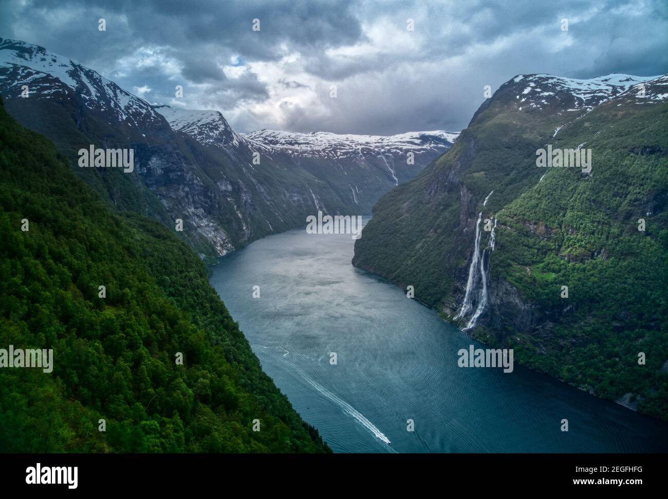 Seven sisters waterfall in Norway. Dramatic sky in Norvegian fjords. Stock Photo