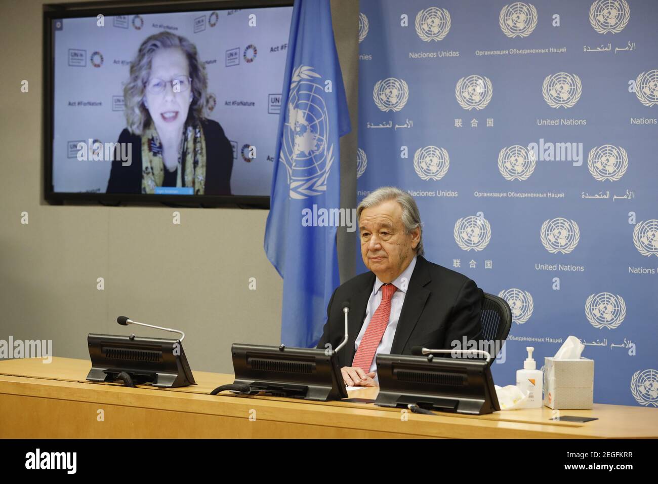 United Nations, Peace with Nature.' at the UN headquarters in New York. 18th Feb, 2021. UN Secretary-General Antonio Guterres and the Executive Director of the UN Environment Programme (UNEP) Inger Andersen (on screen) attend a press conference for the launch of a UN Environment Programme report, 'Making Peace with Nature.' at the UN headquarters in New York, on Feb. 18, 2021. Guterres on Thursday asked for global action to stop 'a senseless and suicidal war on nature' and address climate disruption, biodiversity loss and pollution. Credit: Xie E/Xinhua/Alamy Live News Stock Photo