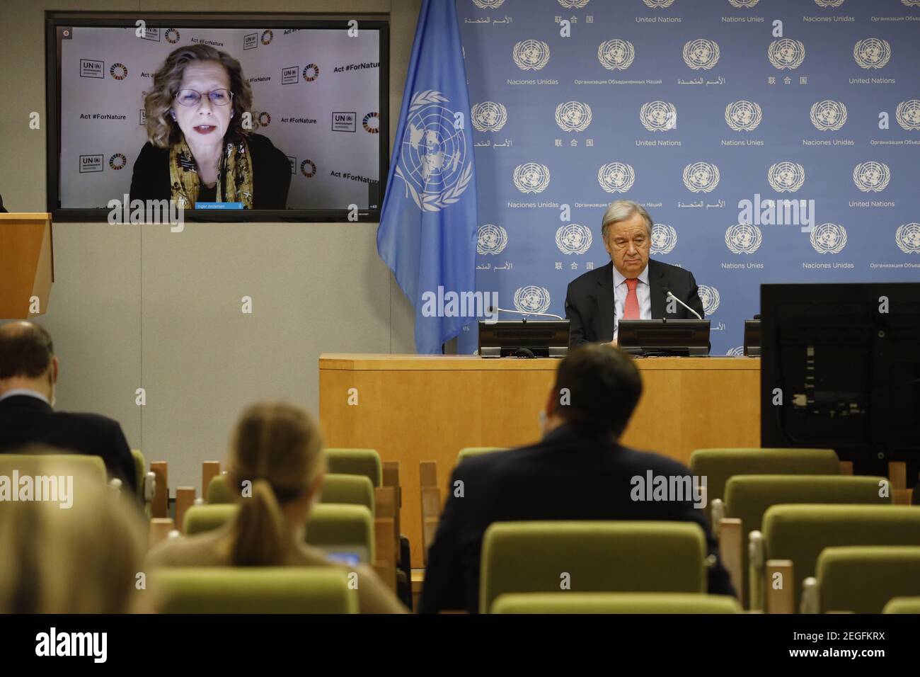 United Nations, Peace with Nature.' at the UN headquarters in New York. 18th Feb, 2021. UN Secretary-General Antonio Guterres and the Executive Director of the UN Environment Programme (UNEP) Inger Andersen (on screen) attend a press conference for the launch of a UN Environment Programme report, 'Making Peace with Nature.' at the UN headquarters in New York, on Feb. 18, 2021. Guterres on Thursday asked for global action to stop 'a senseless and suicidal war on nature' and address climate disruption, biodiversity loss and pollution. Credit: Xie E/Xinhua/Alamy Live News Stock Photo