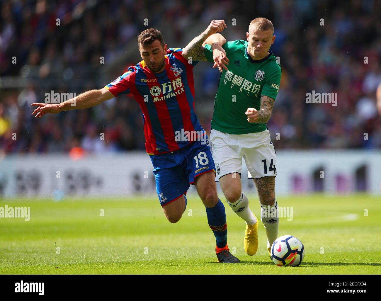 Soccer Football - Premier League - Crystal Palace vs West Bromwich Albion - Selhurst Park, London, Britain - May 13, 2018   Crystal Palace's James McArthur in action with West Bromwich Albion's James McClean    REUTERS/Hannah McKay    EDITORIAL USE ONLY. No use with unauthorized audio, video, data, fixture lists, club/league logos or "live" services. Online in-match use limited to 75 images, no video emulation. No use in betting, games or single club/league/player publications.  Please contact your account representative for further details. Stock Photo