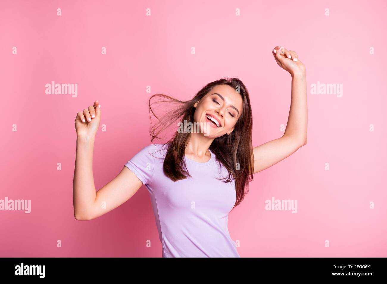Photo of adorable smiling lady raise hands wear casual outfit isolated ...