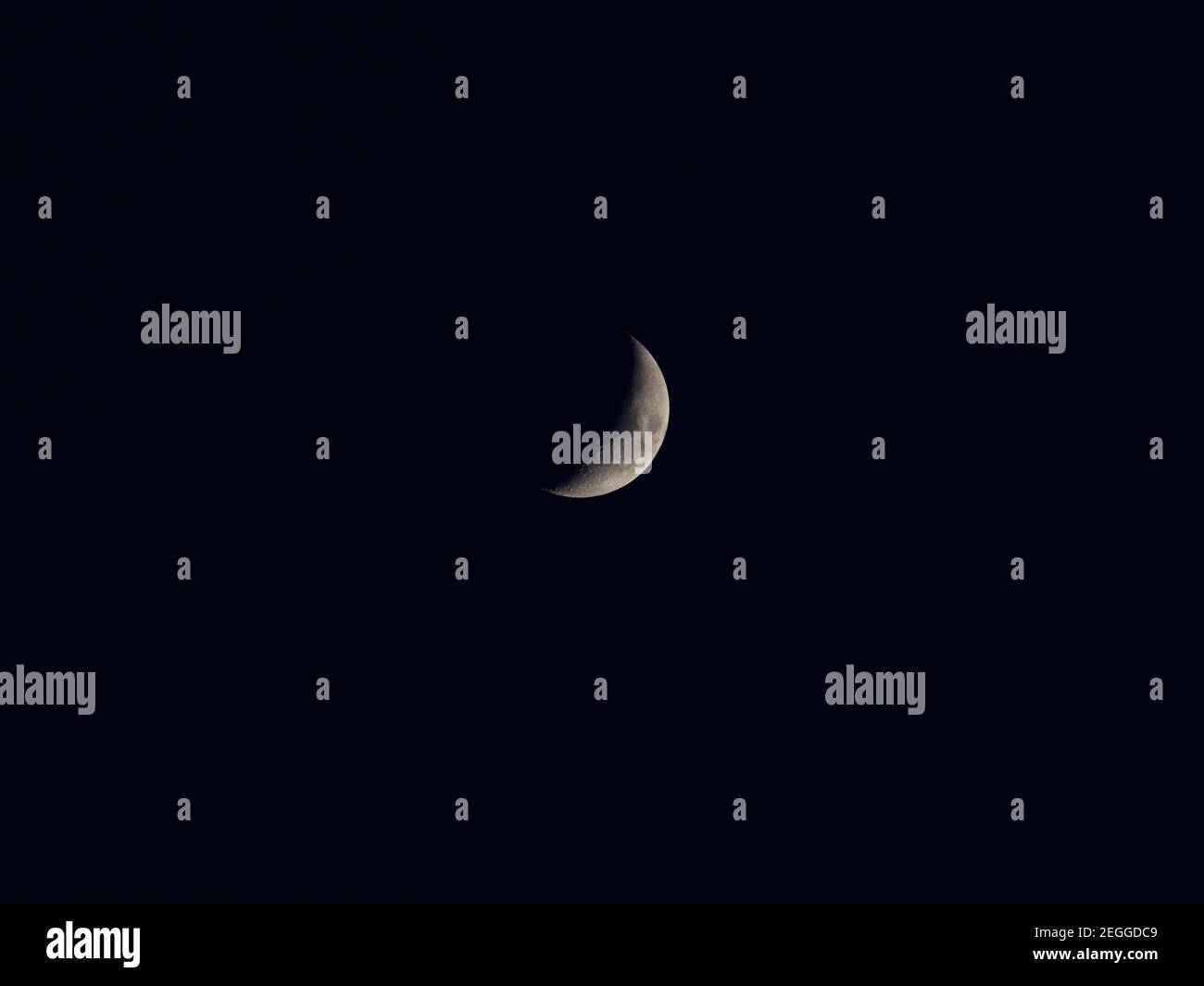a closeup of the waxing moon with its lunar craters Stock Photo Alamy
