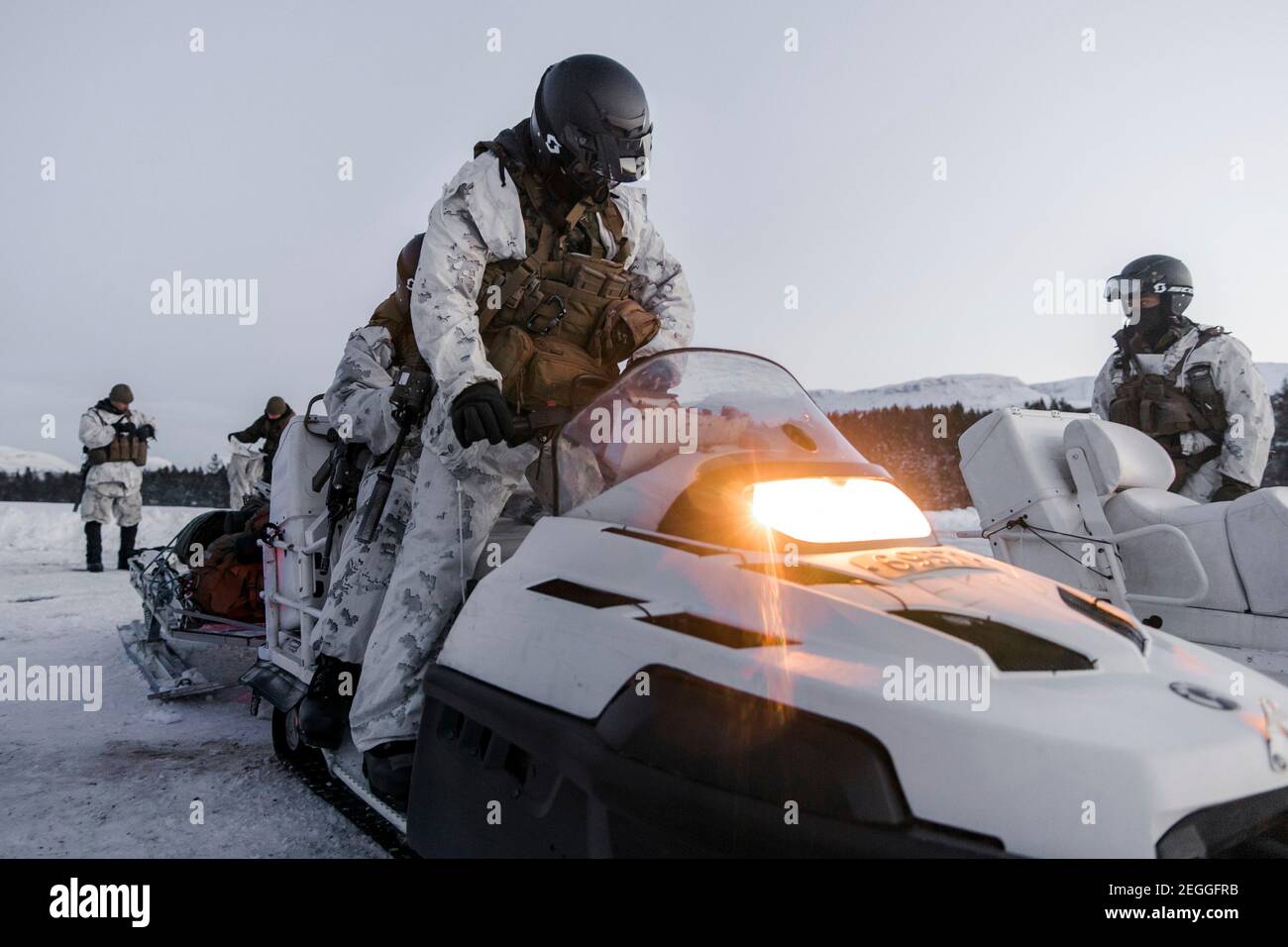 U.S. Marines with Marine Rotational Force Europe prepare for cold weather snowmobile training February 17, 2021 in Setermoen, Norway. Stock Photo
