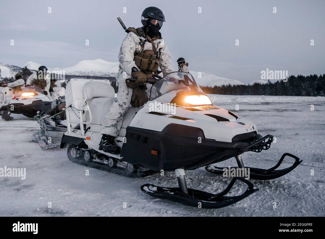 U.S. Marines with Marine Rotational Force Europe prepare for cold weather snowmobile training February 17, 2021 in Setermoen, Norway. Stock Photo