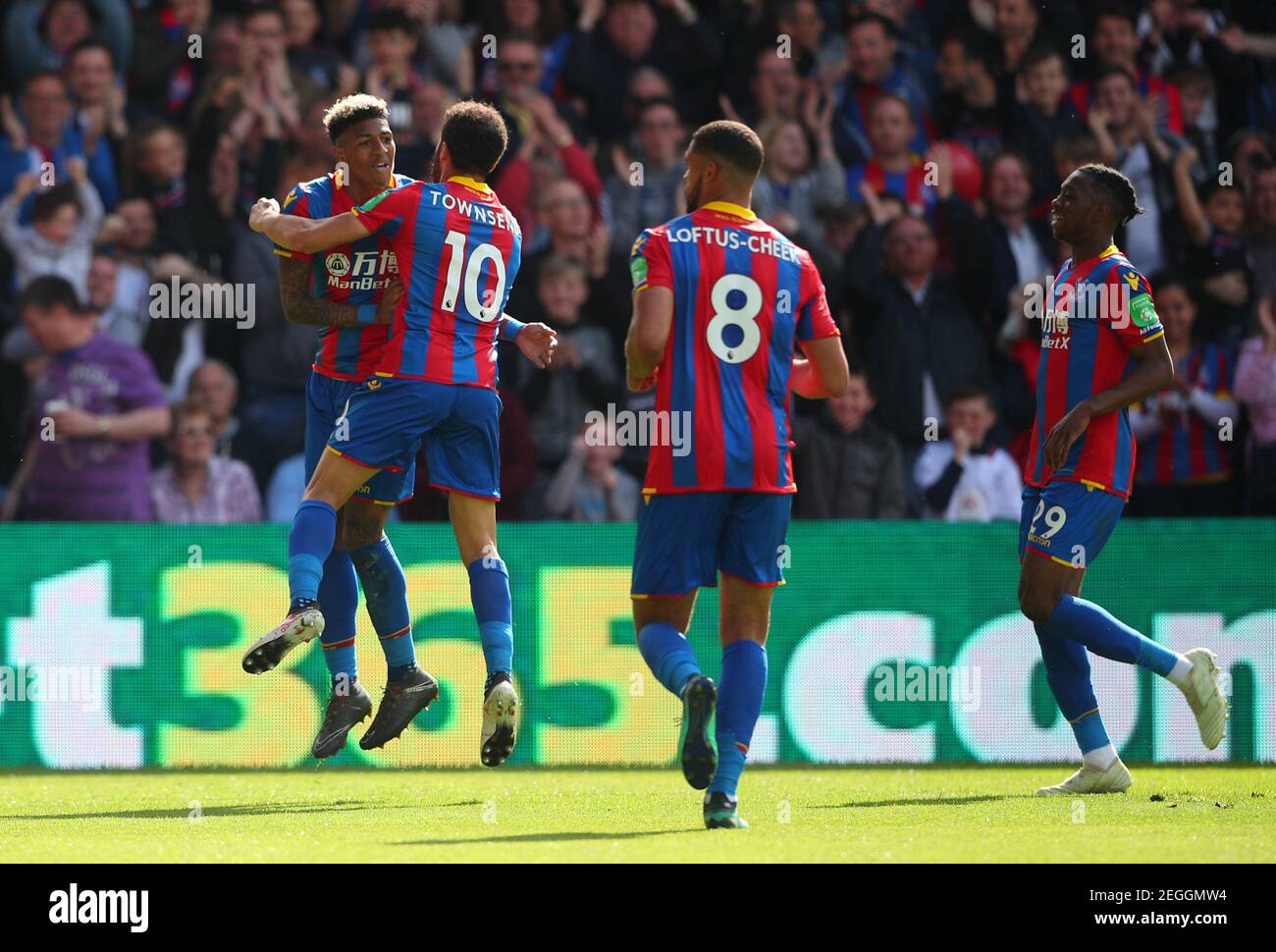 Soccer Football - Premier League - Crystal Palace vs West Bromwich Albion - Selhurst Park, London, Britain - May 13, 2018   Crystal Palace's Patrick van Aanholt celebrates scoring their second goal with team mates    REUTERS/Hannah McKay    EDITORIAL USE ONLY. No use with unauthorized audio, video, data, fixture lists, club/league logos or "live" services. Online in-match use limited to 75 images, no video emulation. No use in betting, games or single club/league/player publications.  Please contact your account representative for further details. Stock Photo