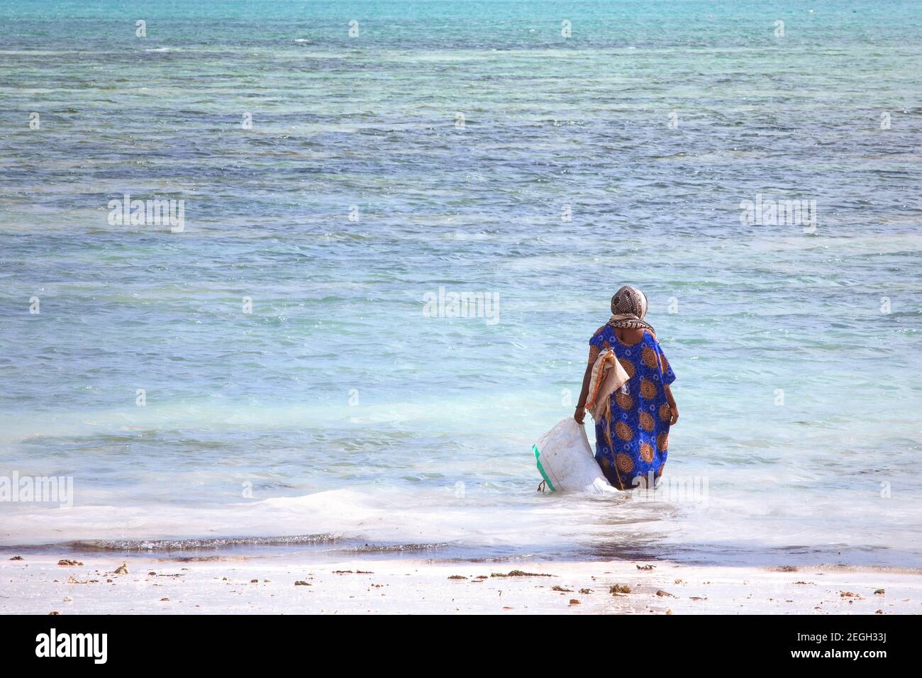 Woman in dress wading in water hi-res stock photography and images - Alamy