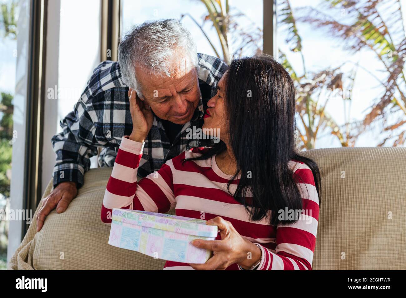 Old couple in valentines day with lovely presents  Stock Photo