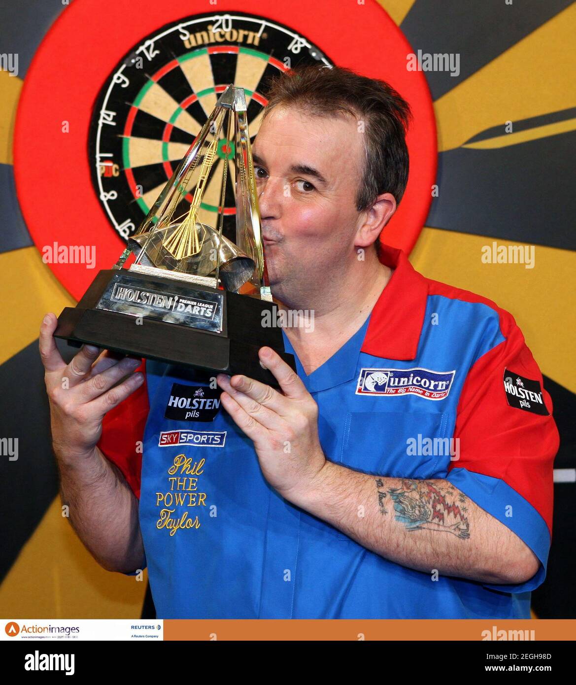 Phil taylor celebrates with the trophy hires stock photography and
