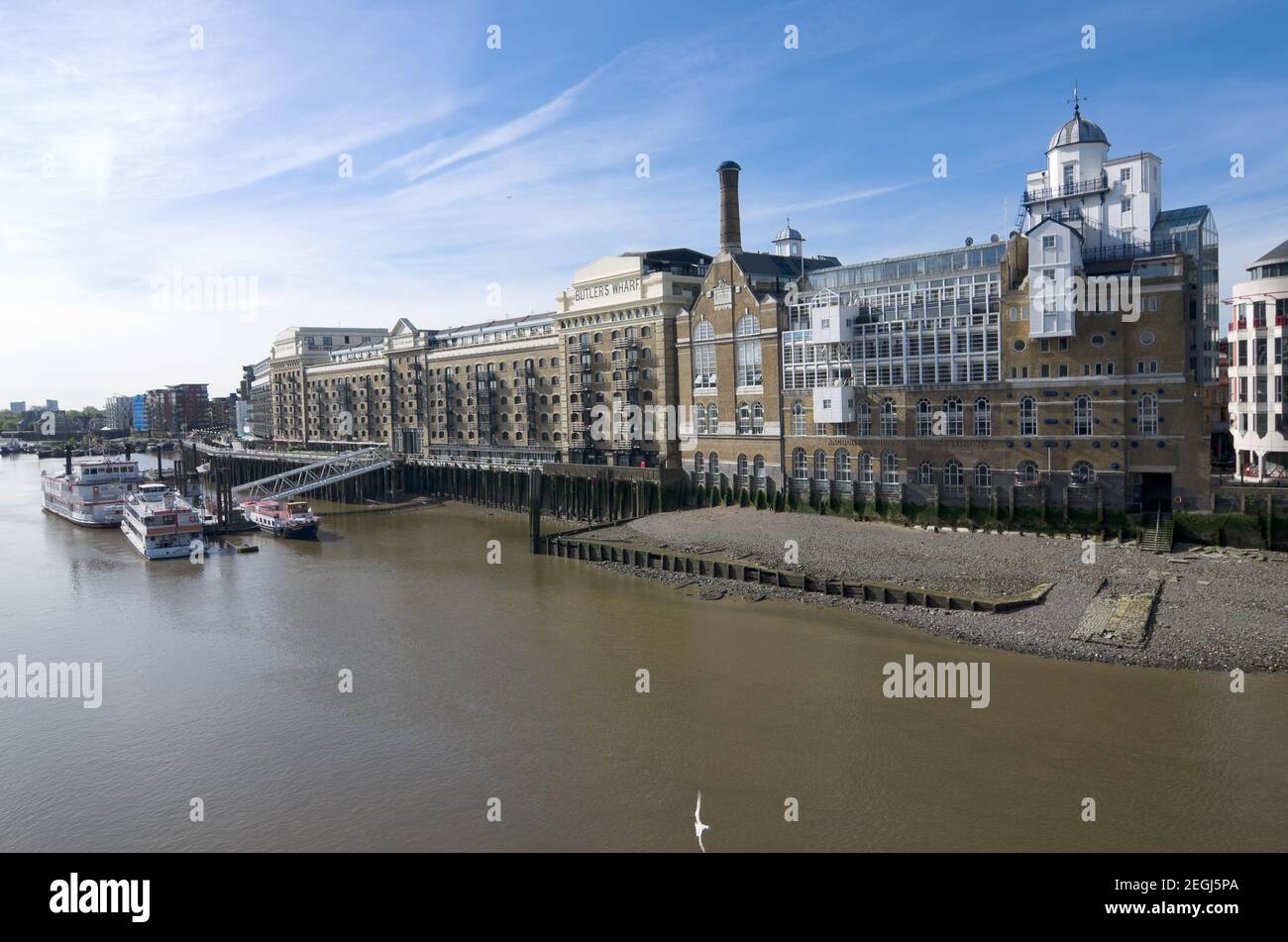 LONDON, ENGLAND - MAY 26: Since the 1980s, Butler's Wharf has been transformed from a derelict site on the River Thames into luxury flats, with restau Stock Photo