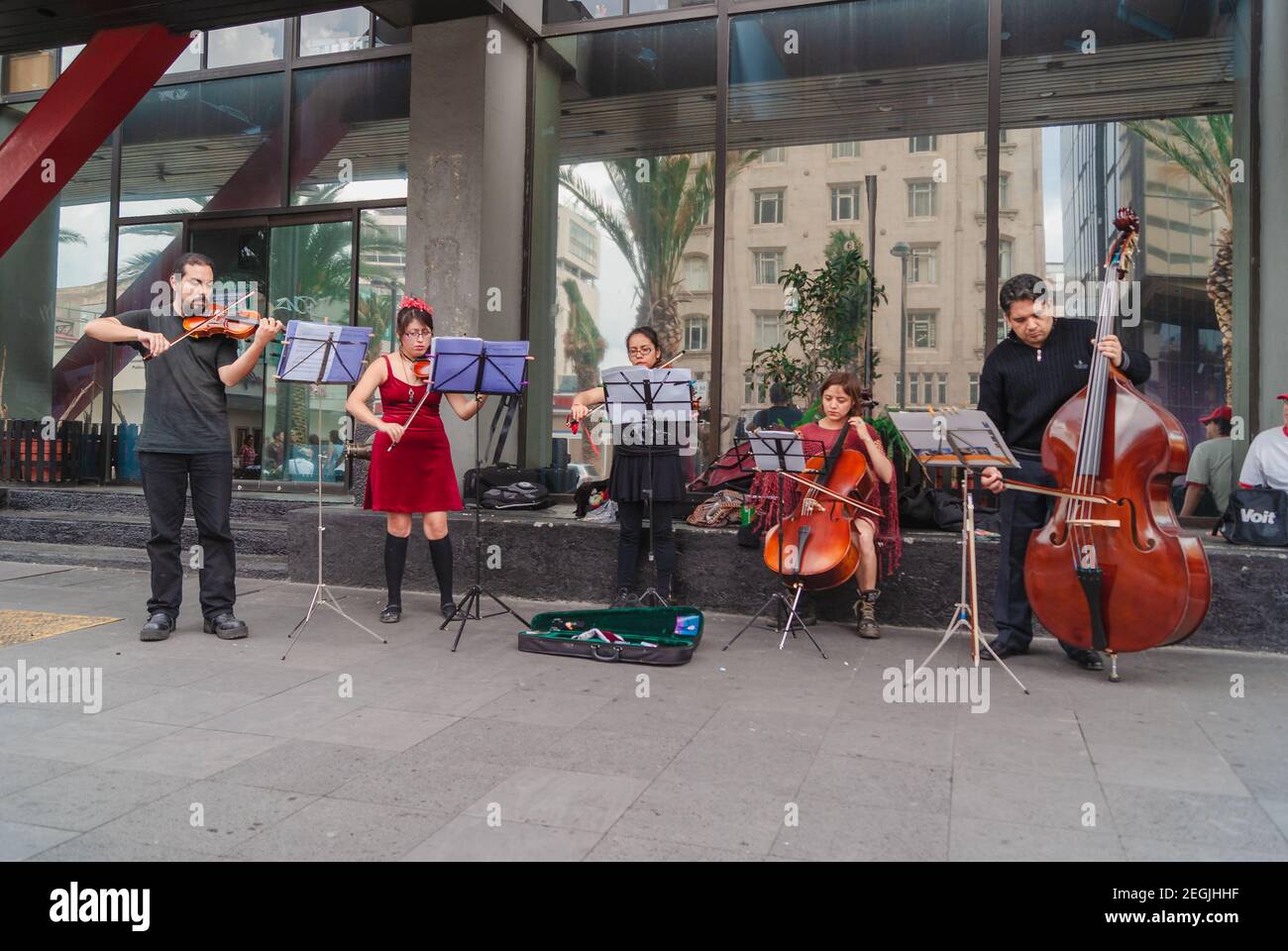 Mexico, Mexico City, August 26, 2012, Group of typical street musicians of the Mexican streets, they play classical music filling the city with musica Stock Photo