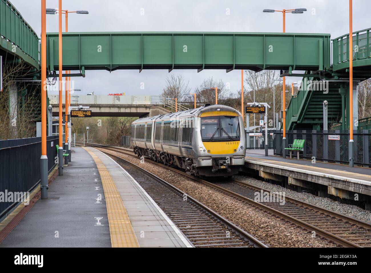 Chiltern Railways 168322 heads through Stratford Upon Avon Parkway with