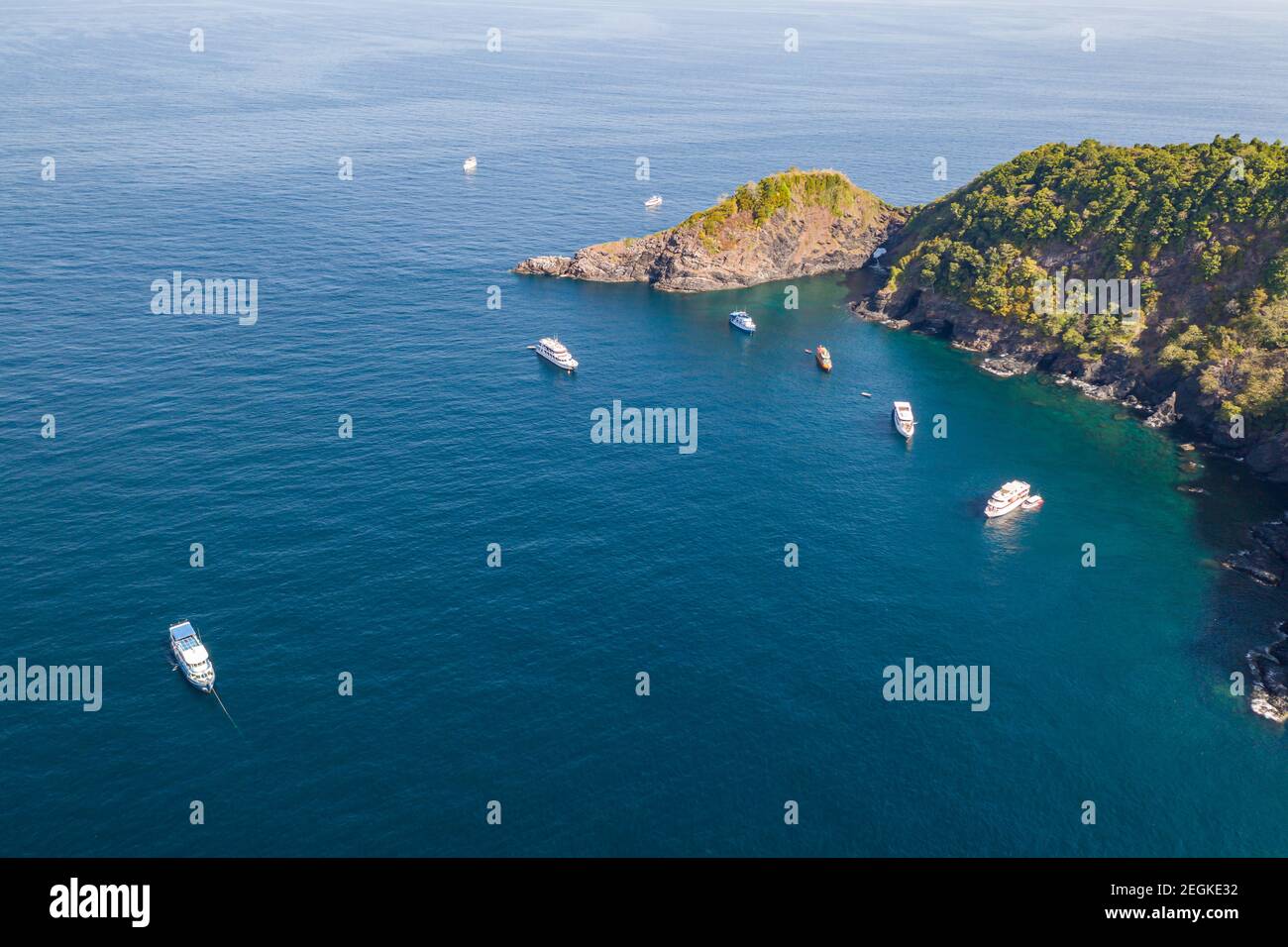 Aerial view of SCUBA diving boats moored above a coral reef at Ko Bon, Similan Islands, Thailand Stock Photo