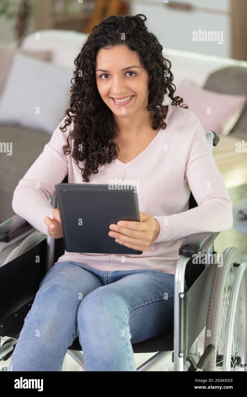Disabled young woman using hi-res stock photography and images - Alamy