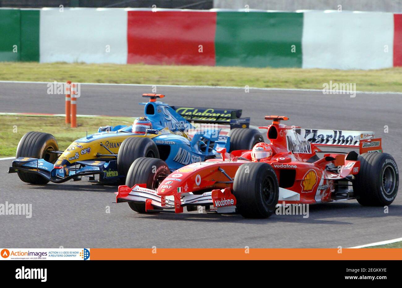Formula One - F1 - Japanese Grand Prix 2005 - Suzuka - 9/10/05 Ferrari's  Michael Schumacher and Renault's Fernando Alonso in action Mandatory  Credit: Action Images / Crispin Thruston Livepic Stock Photo - Alamy