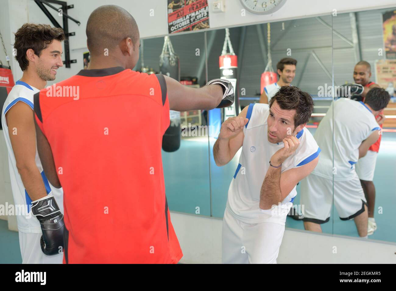 Man ducking under boxer's punch Stock Photo Alamy
