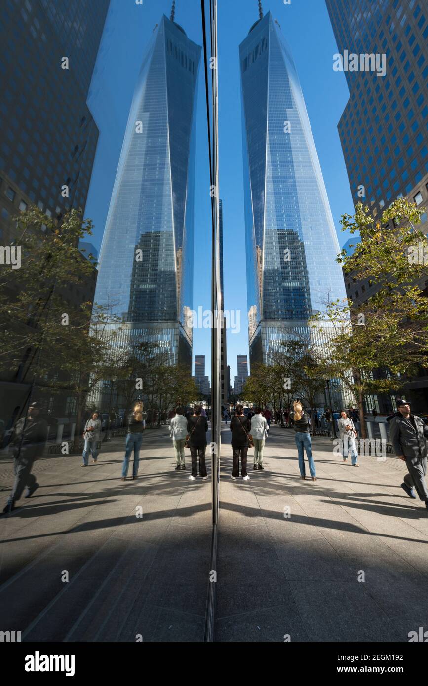 One World Trade Center and the other Lower Manhattan skyscraper reflect