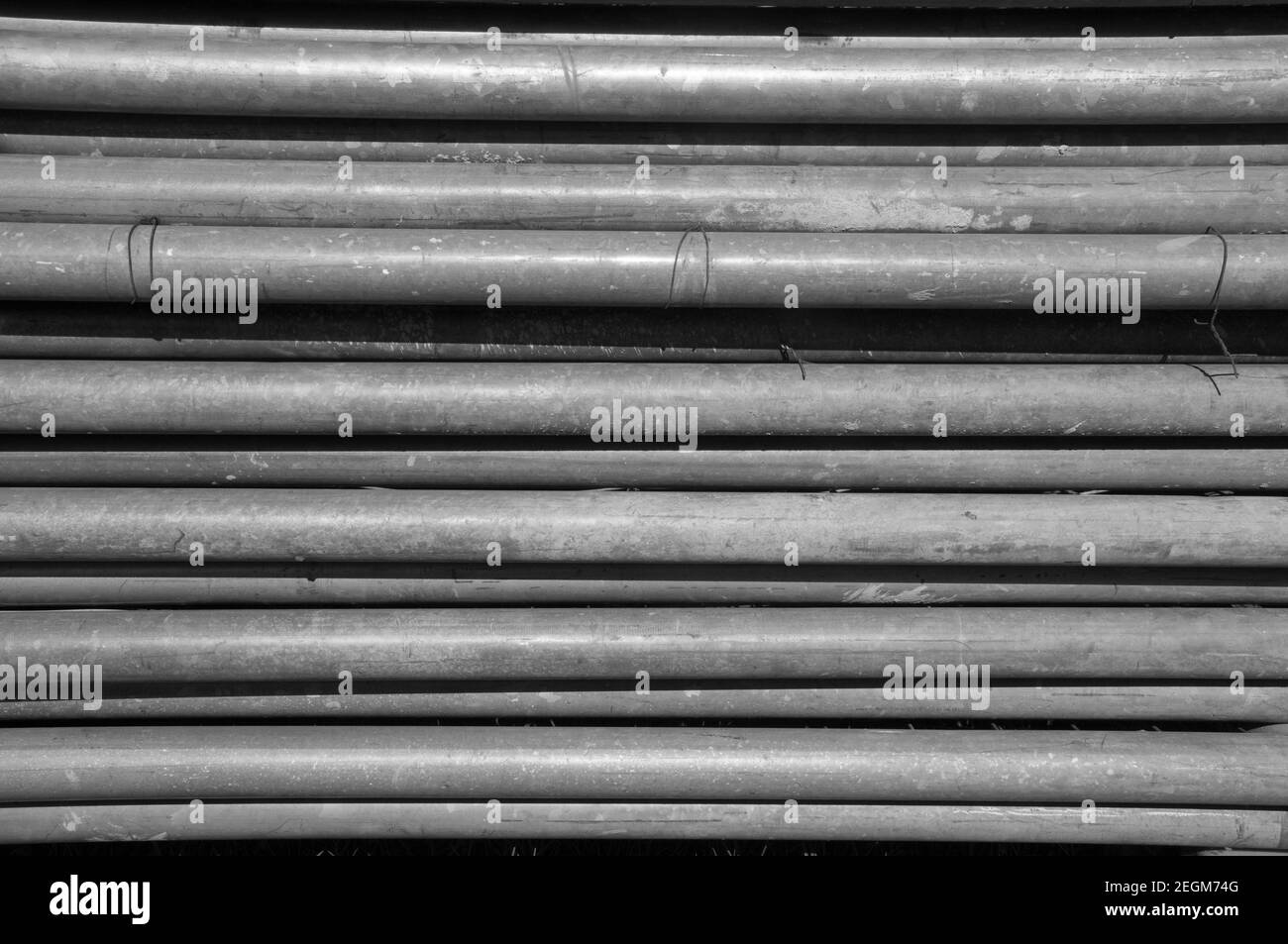 Stacked metal pipes (detail) in preparation for drainage repair works