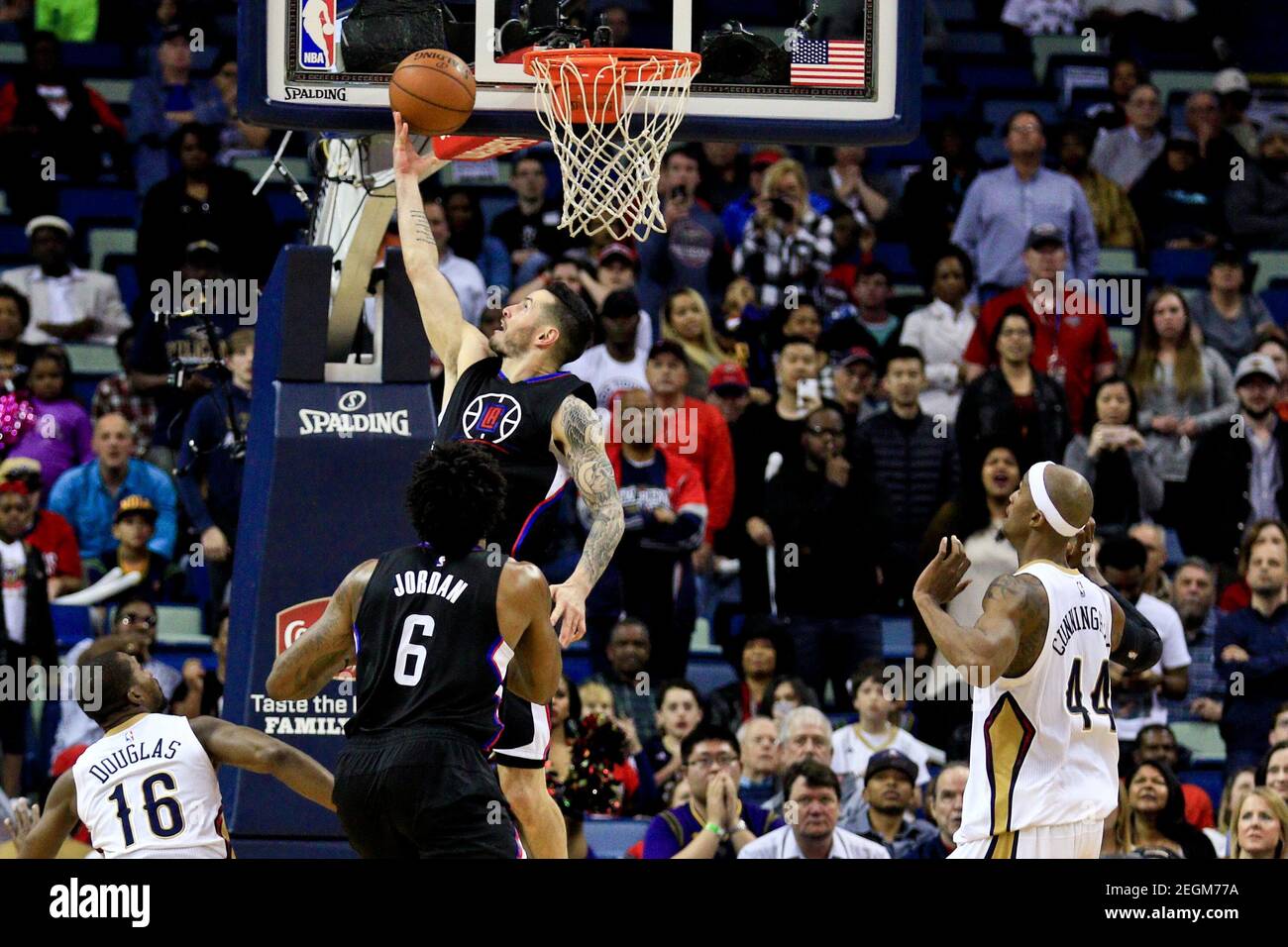 Mar 20, 2016; New Orleans, LA, USA; Los Angeles Clippers guard J.J. Redick (4) shoots against the New Orleans Pelicans during the fourth quarter of a game at the Smoothie King Center. The Pelicans defeated the Clippers 109-105. Mandatory Credit: Derick E. Hingle-USA TODAY Sports  / Reuters  Picture Supplied by Action Images   (TAGS: Sport Basketball NBA) *** Local Caption *** 2016-03-21T013031Z 706497698 NOCID RTRMADP 3 NBA-LOS-ANGELES-CLIPPERS-AT-NEW-ORLEANS-PELICANS.JPG Stock Photo