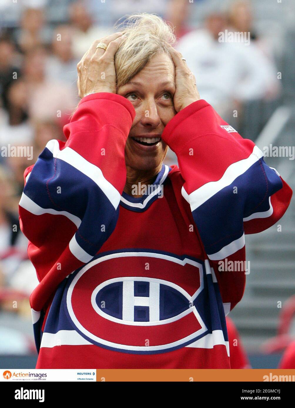 Tennis - Rogers Cup, Sony Ericsson WTA Tour - Montreal, Canada - 15/8/06  Tennis player Martina Navratilova, wearing a Montreal Canadiens hockey jersey, reacts as she is honoured during a ceremony at the Rogers Cup, Sony Ericsson WTA Tour in Montreal  Mandatory Credit: Action Images / Chris Wattie  Livepic Stock Photo