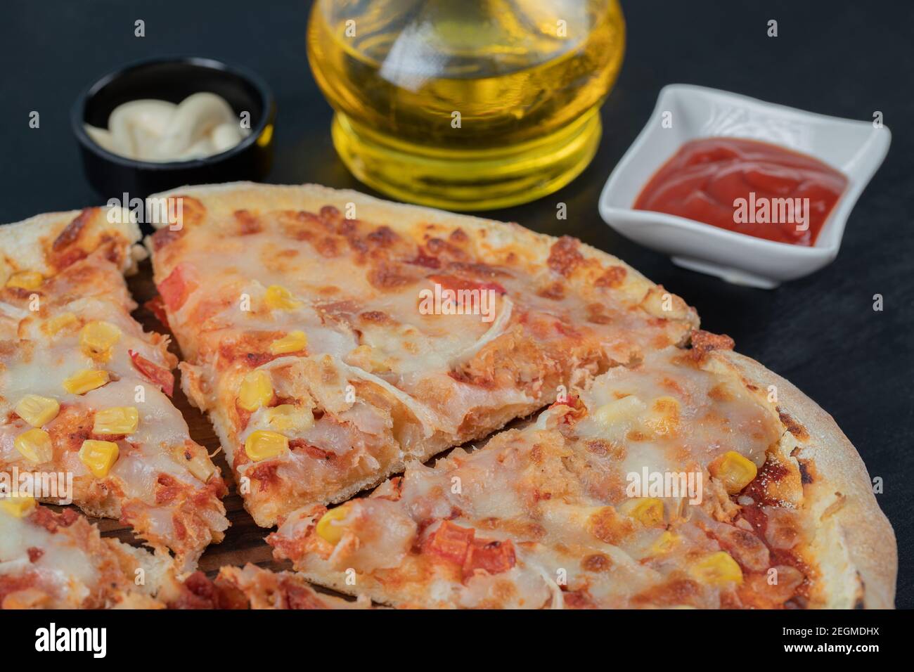 Margarita pizza with ketchup, mayonnaise and olive oil Stock Photo Alamy