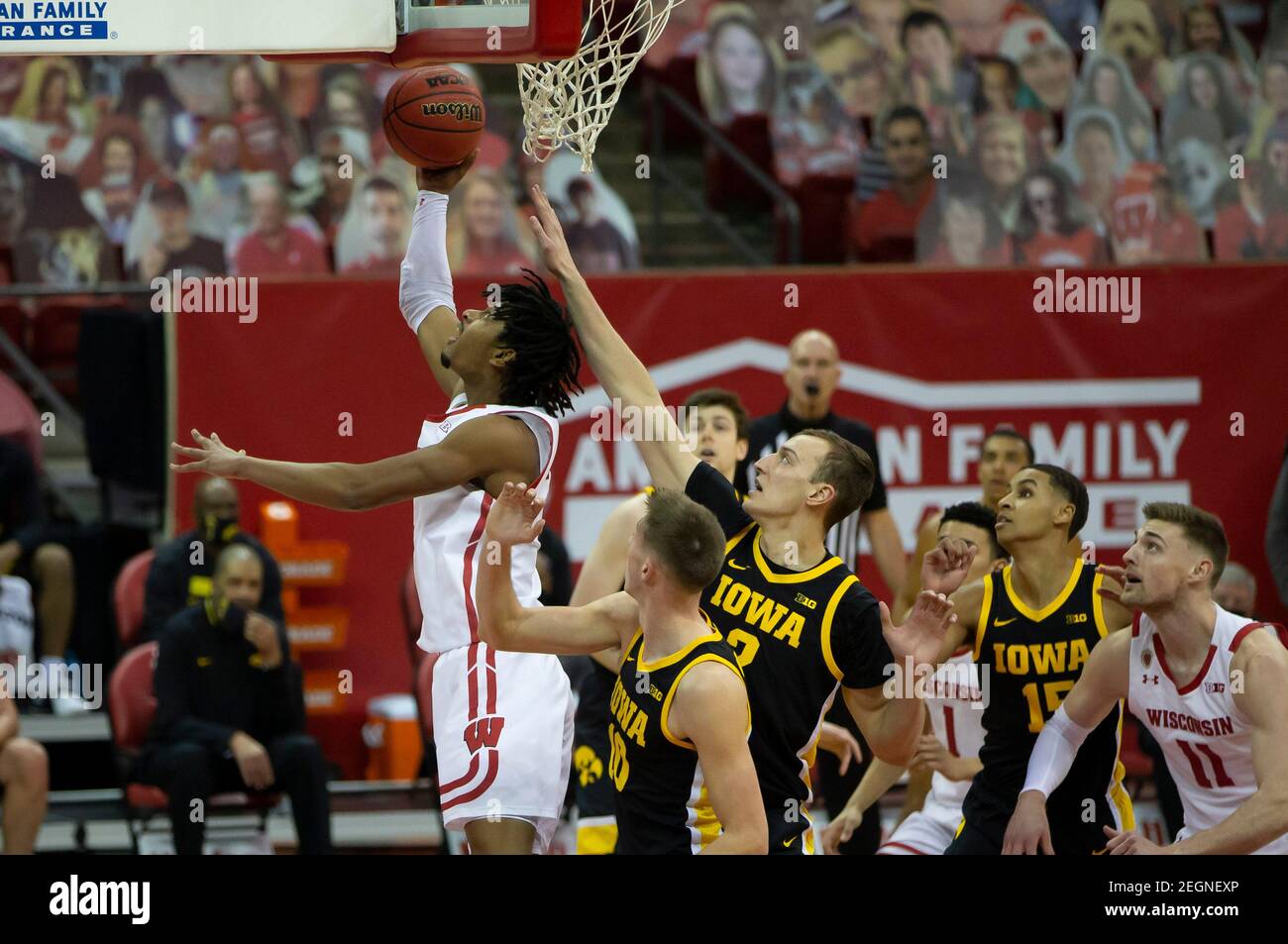 Madison, WI, USA. 18th Feb, 2021. Wisconsin Badgers forward Aleem Ford (2) goes up for a shot under the basket during the NCAA basketball game between the Iowa Hawkeyes and the Wisconsin Badgers at the Kohl Center in Madison, WI. John Fisher/CSM/Alamy Live News Stock Photo