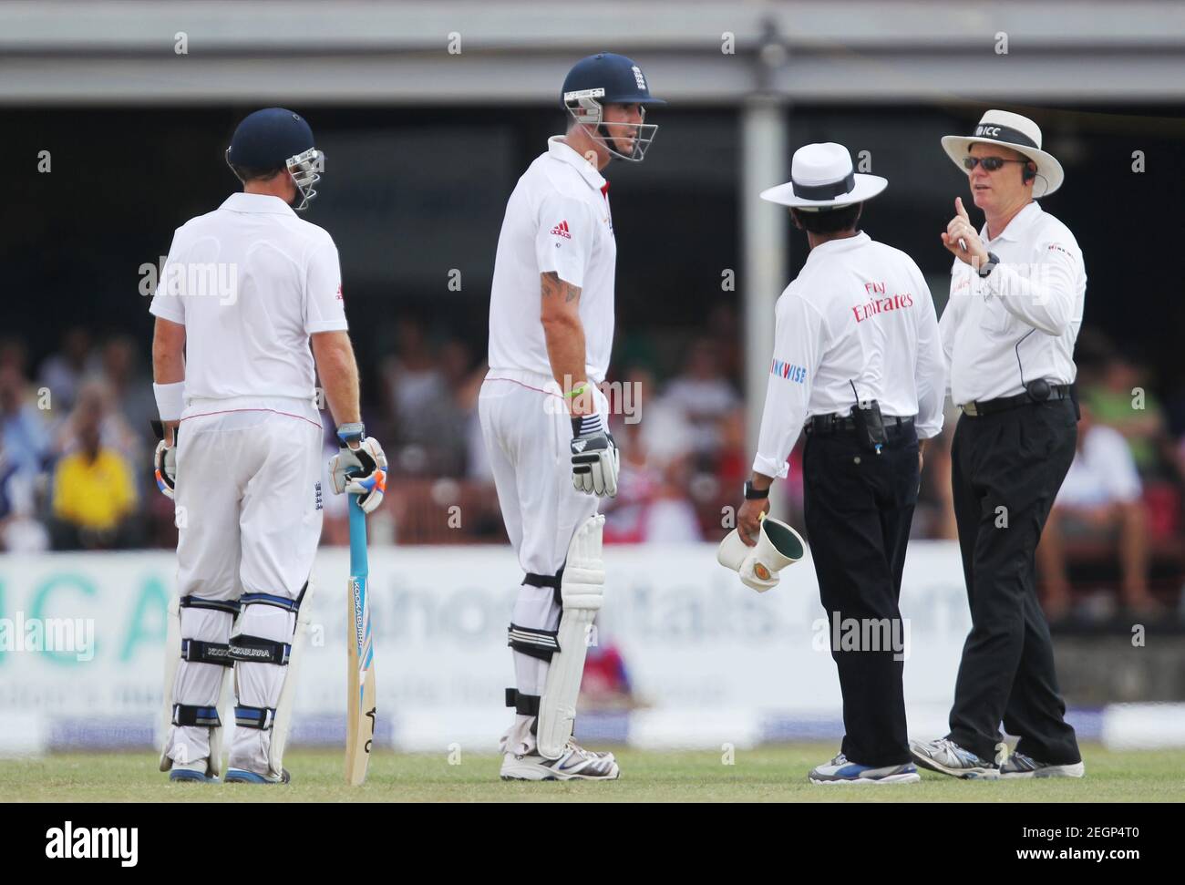 Cricket -  Sri Lanka v England 2nd Test Match - P Sara Oval, Colombo, Sri Lanka - 5/4/12  England's Kevin Pietersen (C) receives a warning from Umpire's Asad Rauf and Bruce Oxenford (R)  Mandatory Credit: Action Images / Jason O'Brien  Livepic Stock Photo