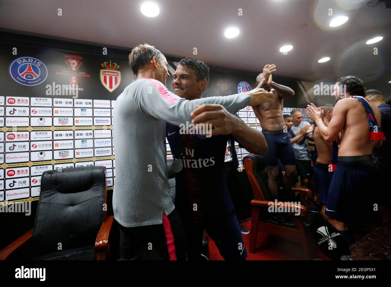 Soccer Football - French Super Cup Trophee des Champions - Paris St Germain v AS Monaco - Shenzhen Universiade Sports Centre, Shenzhen, China - August 4, 2018   Paris St Germain's Thiago Silva celebrates with coach Thomas Tuchel after winning the French Super Cup   REUTERS/Bobby Yip Stock Photo
