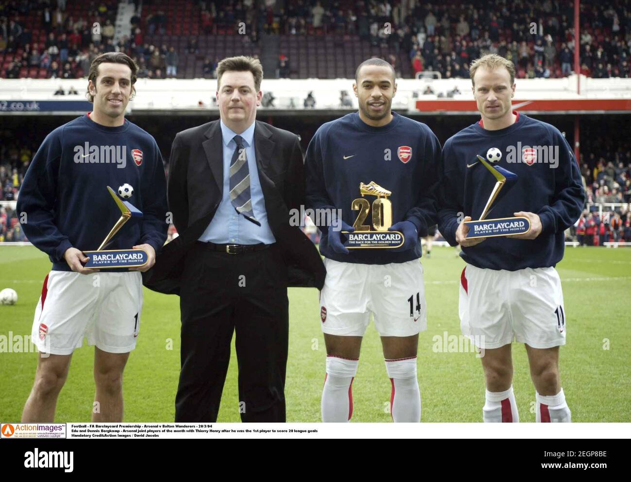 football-fa-barclaycard-premiership-arsenal-v-bolton-wanderers-20304-edu-and-dennis-bergkamp-arsenal-joint-players-of-the-month-with-thierry-henry-after-he-was-the-1st-player-to-score-20-league-goals-mandatory-creditaction-images-david-jacobs-2EGP8BE.jpg