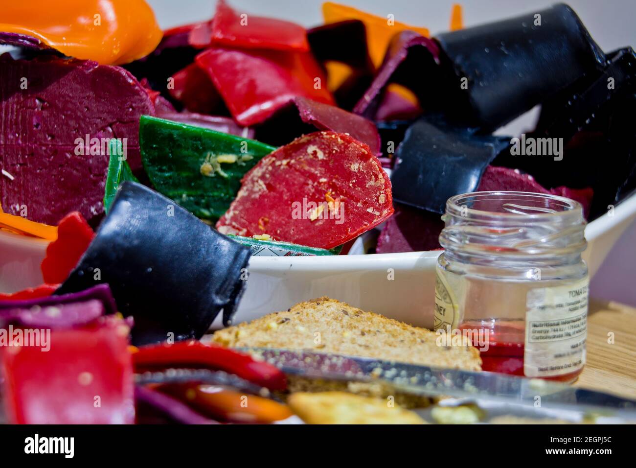 wax, wax cheeses, wax casings, eat all the cheese, eat a lot of cheese