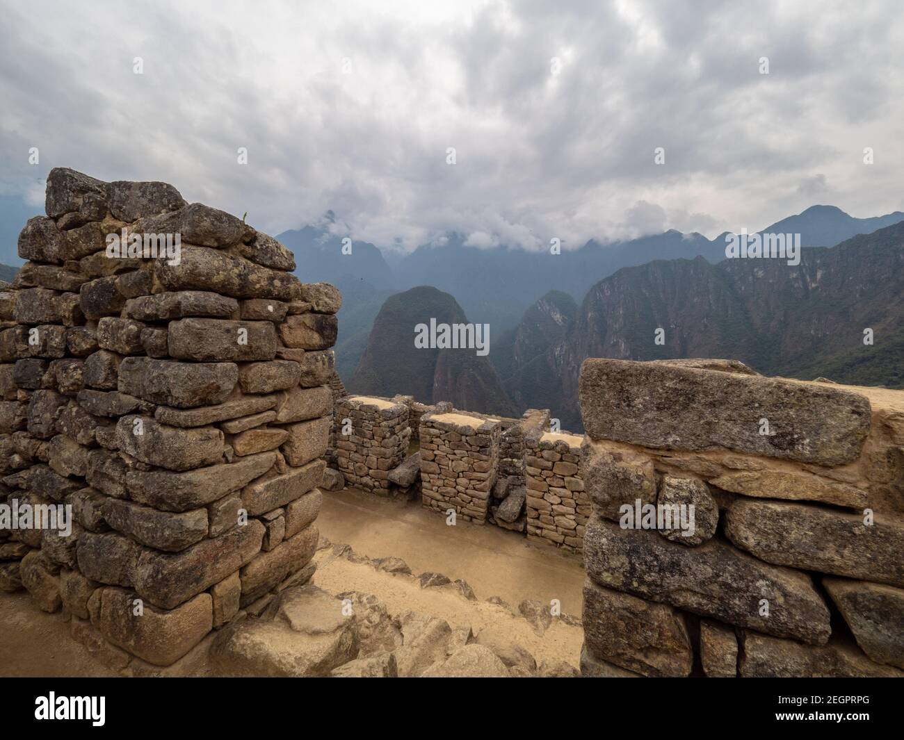 View of the andes mountains from behind Machu Picchu stone walls Stock ...