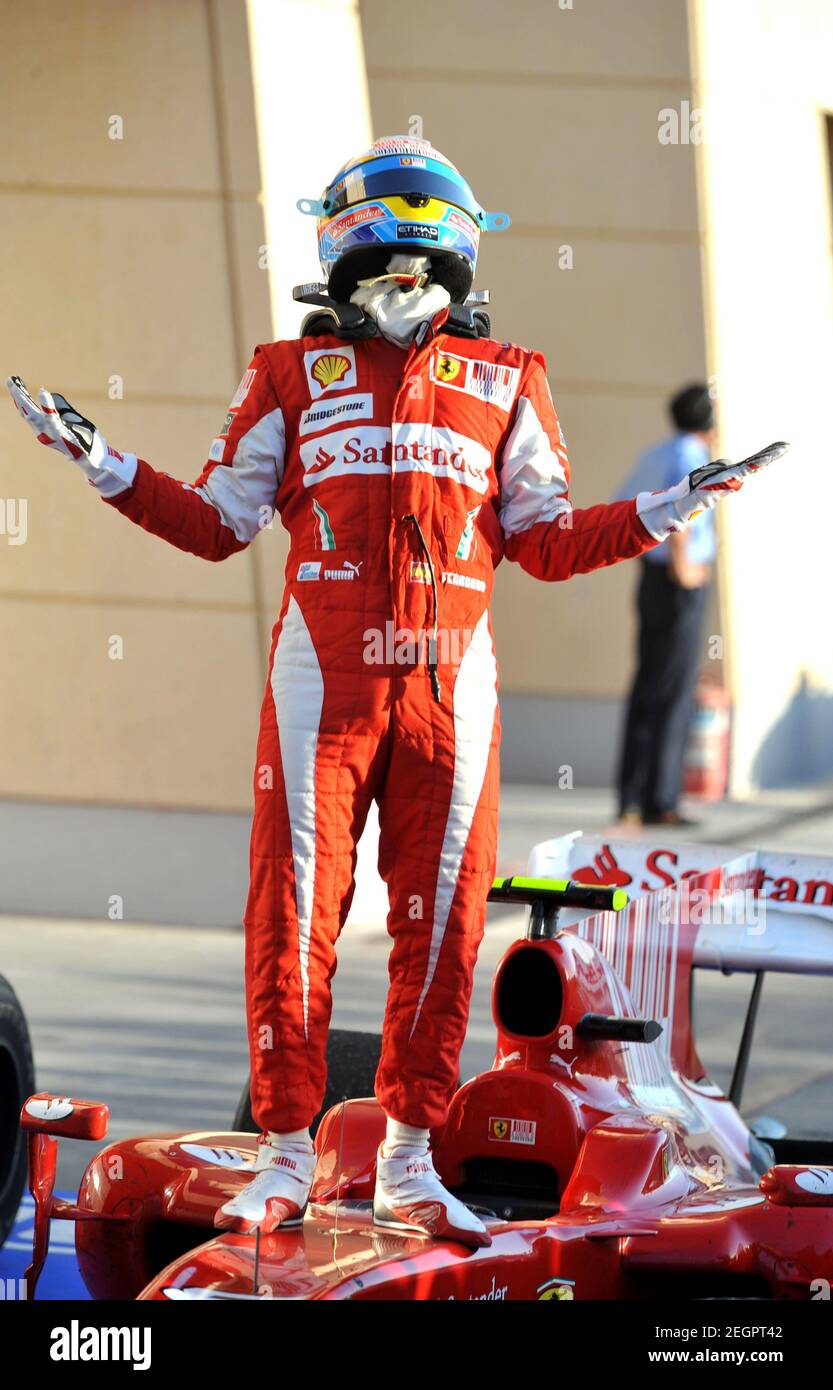 Formula One - F1 - Bahrain Grand Prix 2010 - Bahrain International Circuit,  Sakhir, Manama, Bahrain - 14/3/10 Ferrari's Fernando Alonso celebrates his  win in Parc Ferme Mandatory Credit: Action Images / Crispin Thruston  Livepic Stock Photo - Alamy